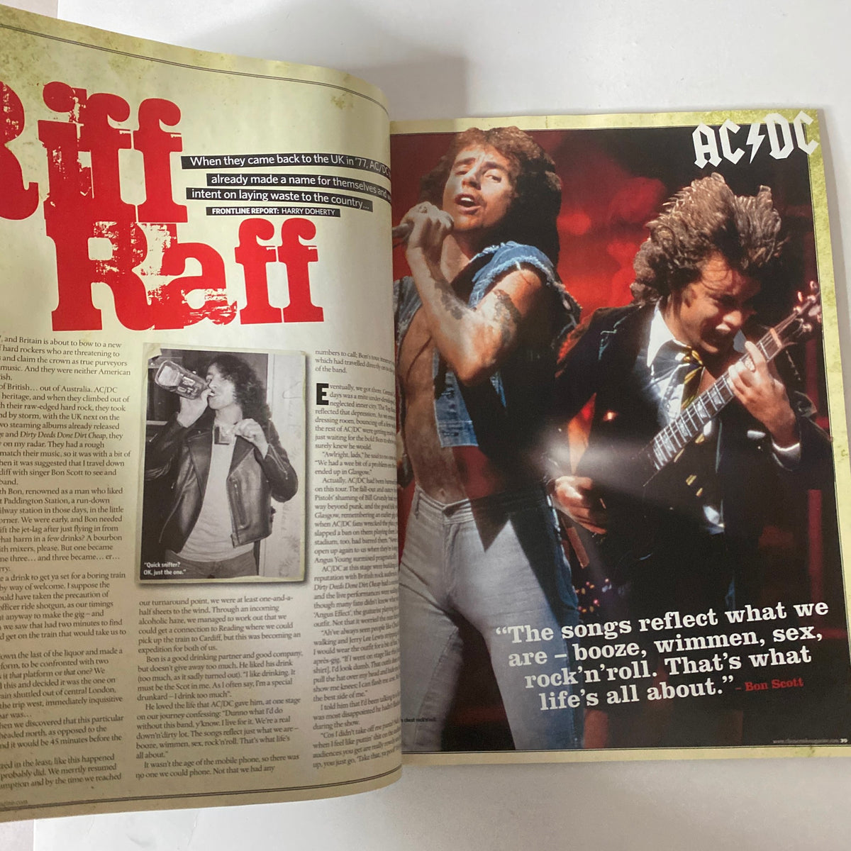 Inside spread of Classic Rock Magazine February 2008 with a focus on AC/DC, featuring Angus Young and Bon Scott, highlighting their influence in rock.