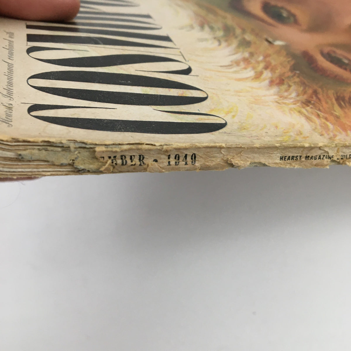 Edge view of VTG Cosmopolitan Magazine September 1949, highlighting the publication date and vintage condition, reflective of its historical significance.