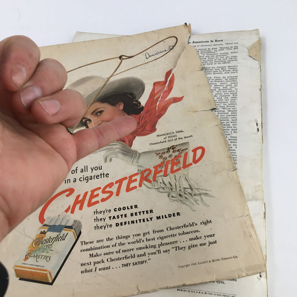 Cover of VTG Cosmopolitan Magazine April 1940 featuring a vintage advertisement for Chesterfield cigarettes and highlighting the magazine's nostalgic appeal.