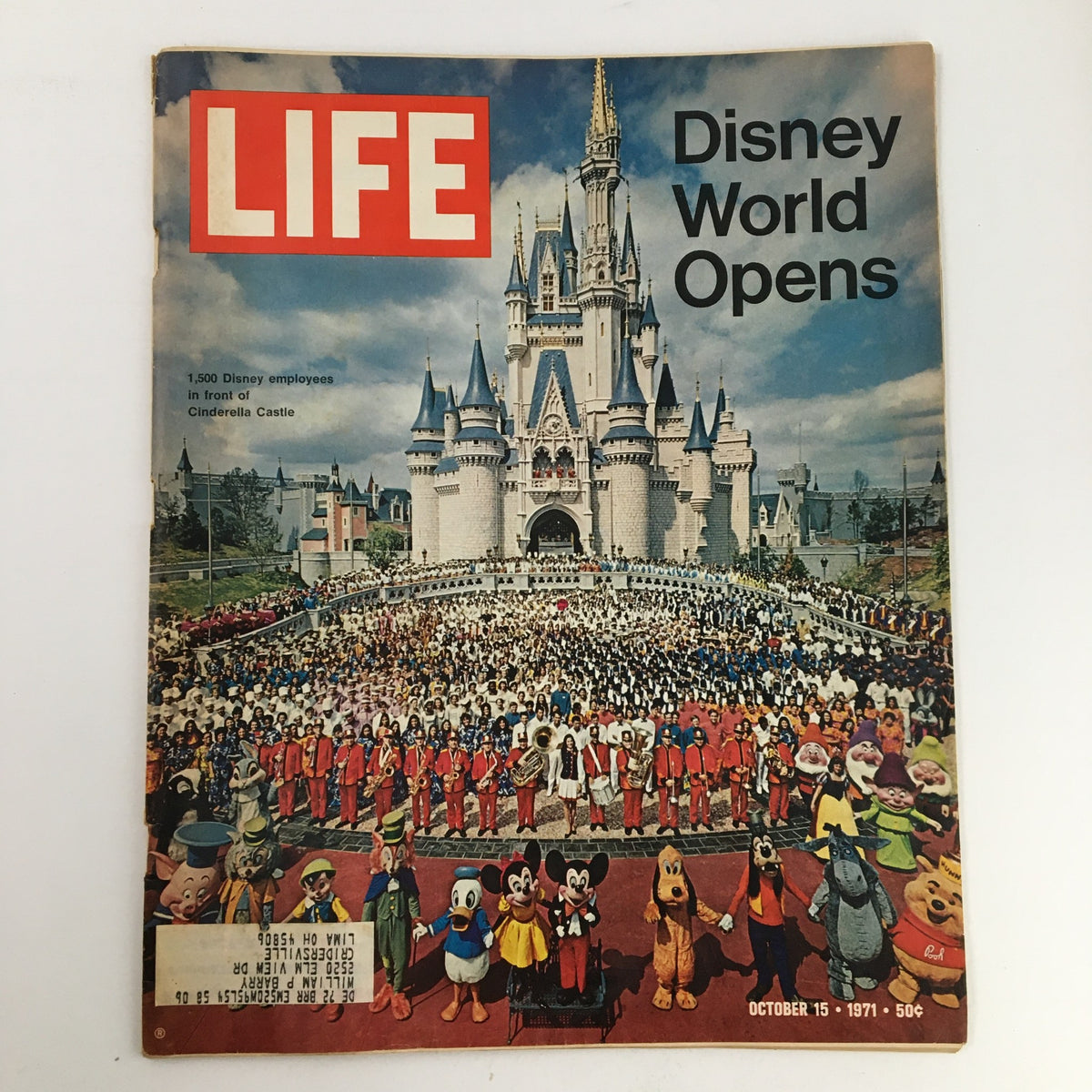 Life Magazine October 15 1971 featuring Disney World Opens in front of Cinderella's Castle with 1,500 Disney employees and characters including Mickey Mouse, Cinderella, and others.