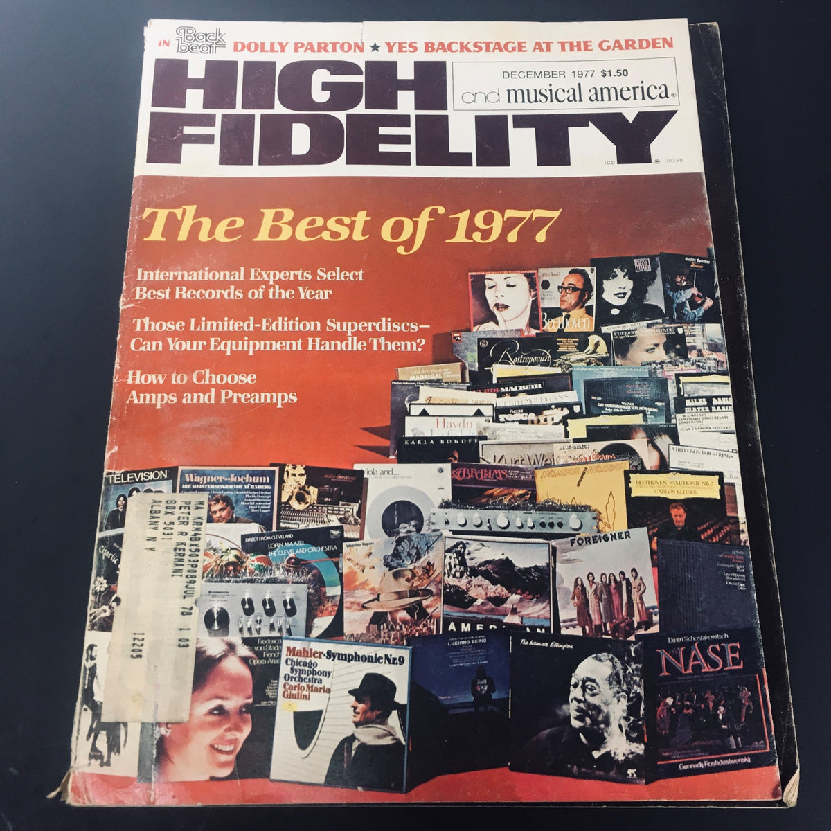 Cover of VTG High Fidelity Magazine from December 1977 featuring articles on audio equipment including 'How to Choose Amps and Preamps', with visuals of popular vinyl records from that era.