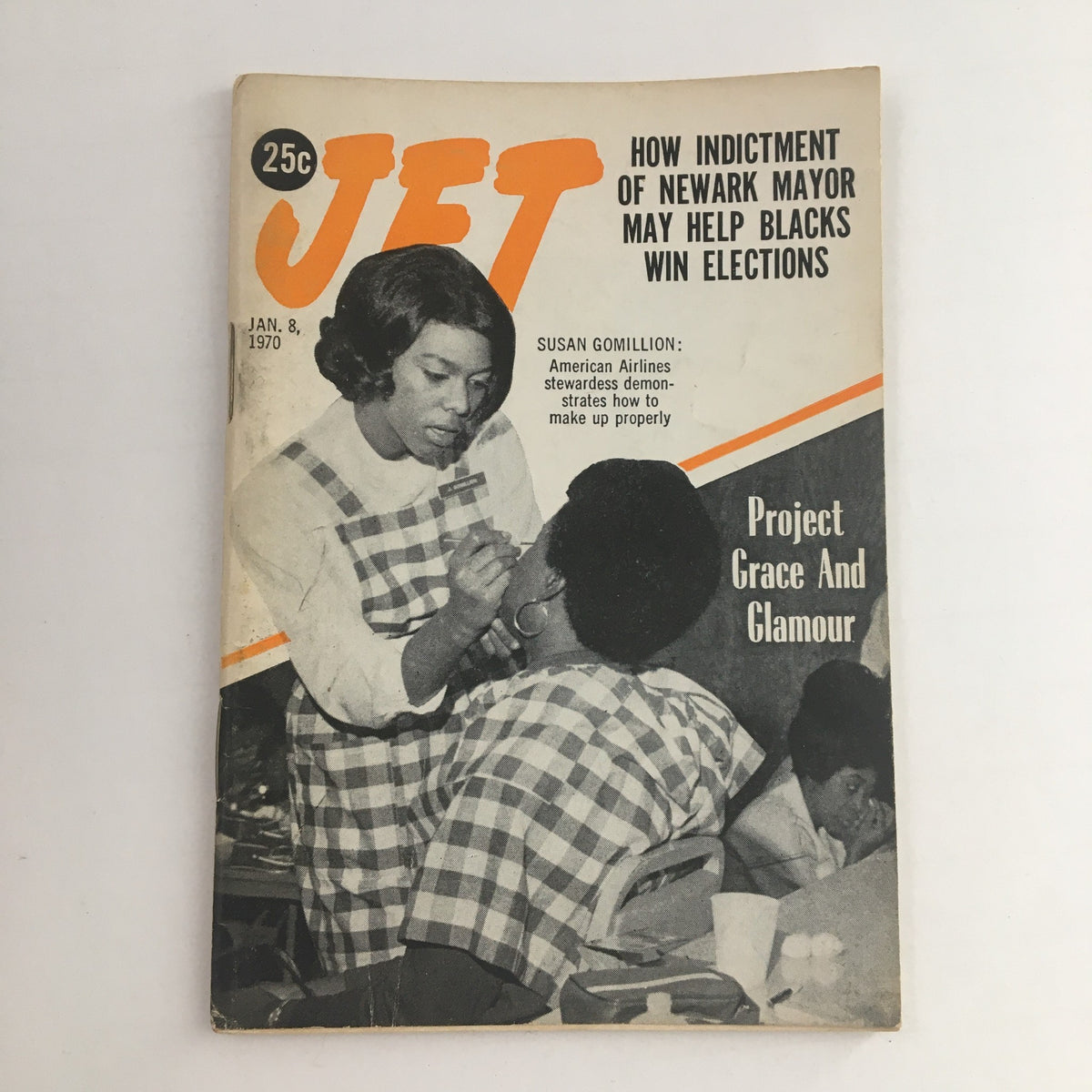 Cover of Jet Magazine, January 8, 1970, featuring Susan Gomillion, American Airlines stewardess demonstrating makeup application. Historical insight into airline culture.