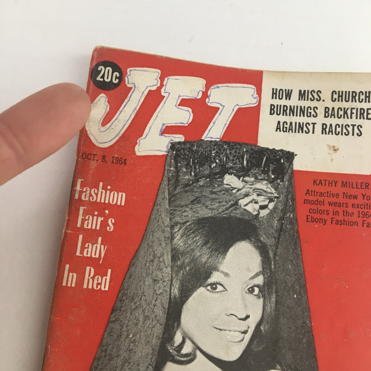 Close-up of Jet Magazine October 8, 1964 featuring Kathy Miller at the Ebony Fashion Fair. The cover highlights the title and model details, emphasizing the historical fashion context and vintage aesthetic.