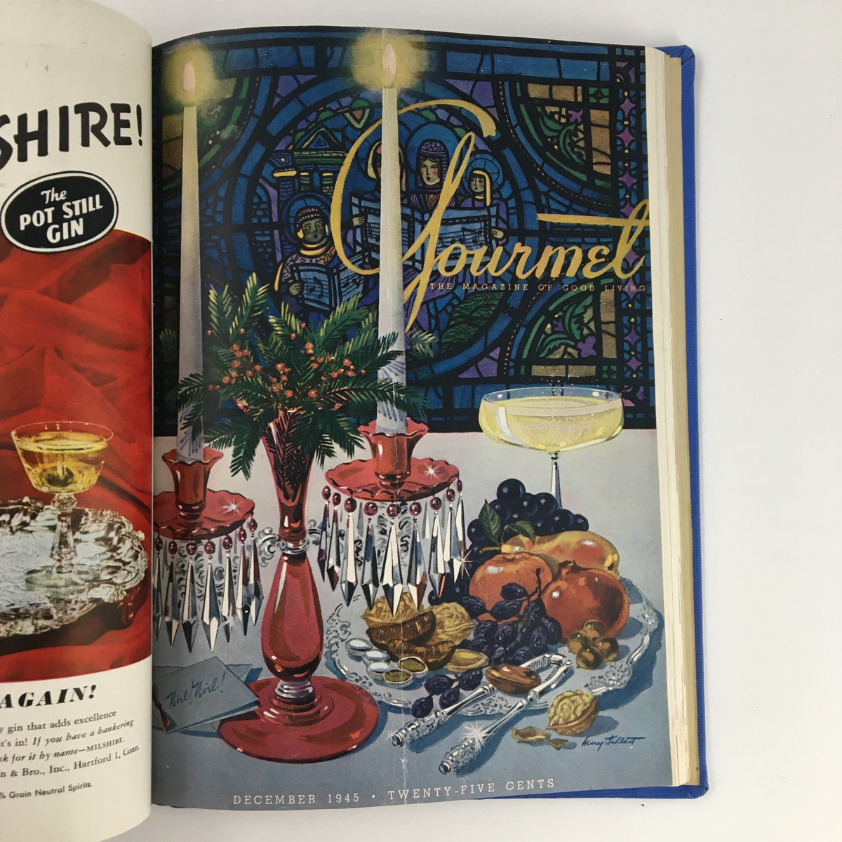 Gourmet: The Magazine of Good Living, December 1945 edition with a decorative table set for the holidays, showcasing wine, fruits, and festive decorations.