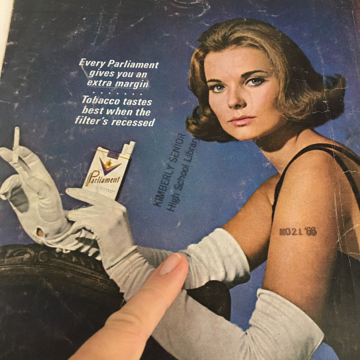 Vintage advertisement cover featuring a glamorous woman promoting Parliament cigarettes, with the magazine title Time Magazine February 28, 1964 visible.