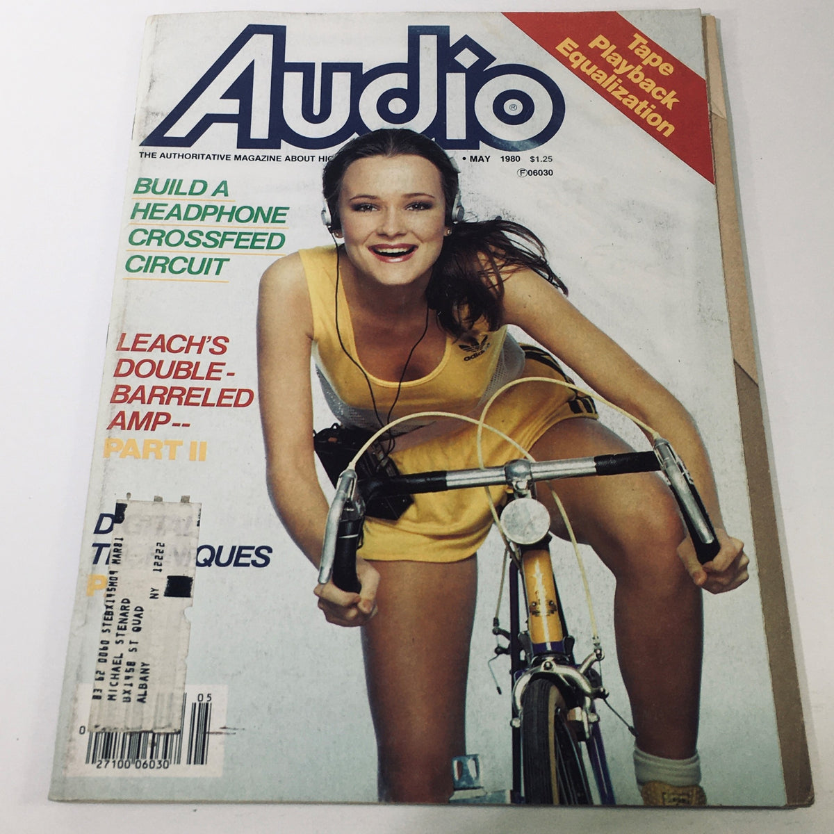 Cover of VTG Audio Music Magazine May 1980 featuring Leach's Double Barreled AMP Part II. The magazine showcases a woman in a yellow athletic outfit, riding a bicycle with headphones, reflecting the vibrant audio culture of the late 1970s and early 1980s.