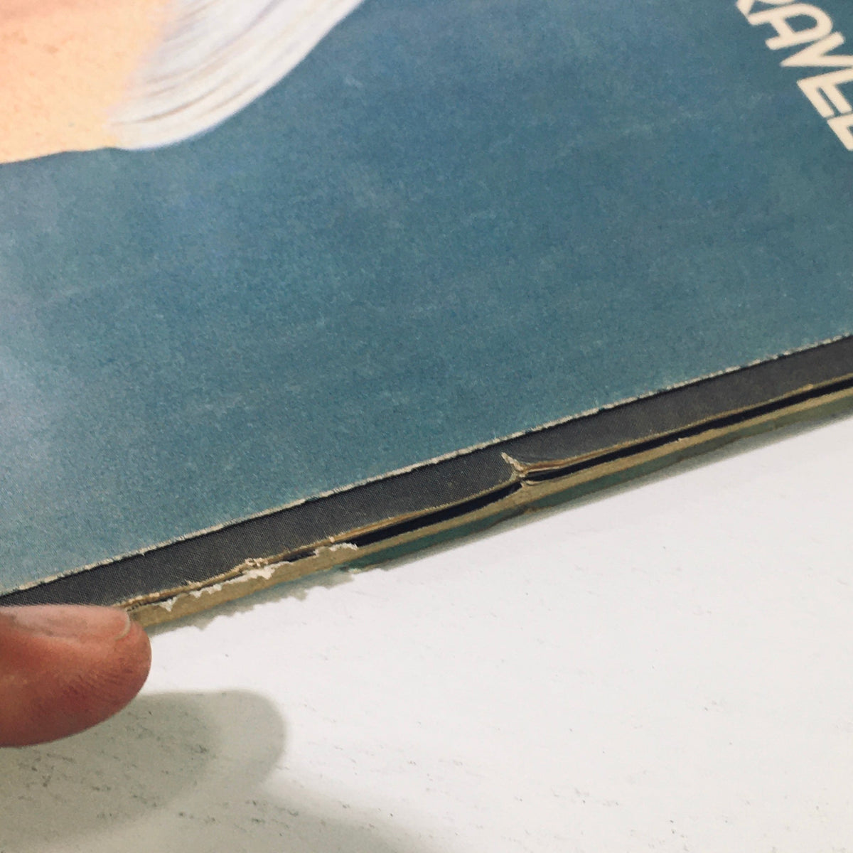 Detailed view of the cover edge of the November 1975 Stereo Review Magazine highlighting Maurice Ravel, emphasizing the magazine's vintage condition.
