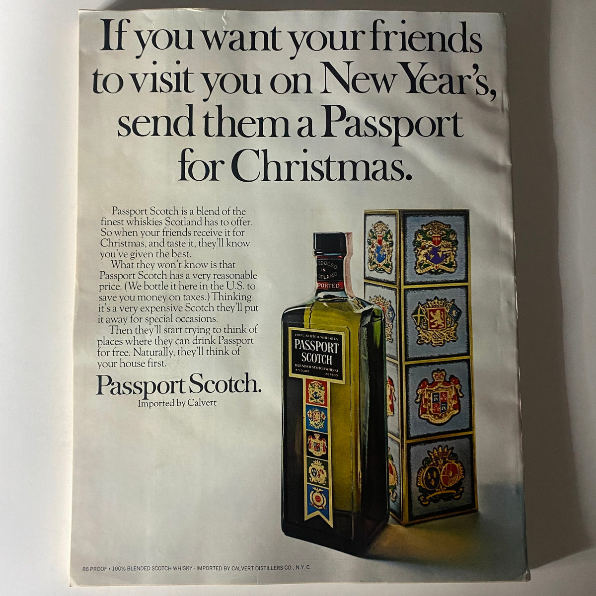 Advert for Passport Scotch in Esquire Magazine December 1969, promoting the beverage as a festive gift for New Year’s celebrations.