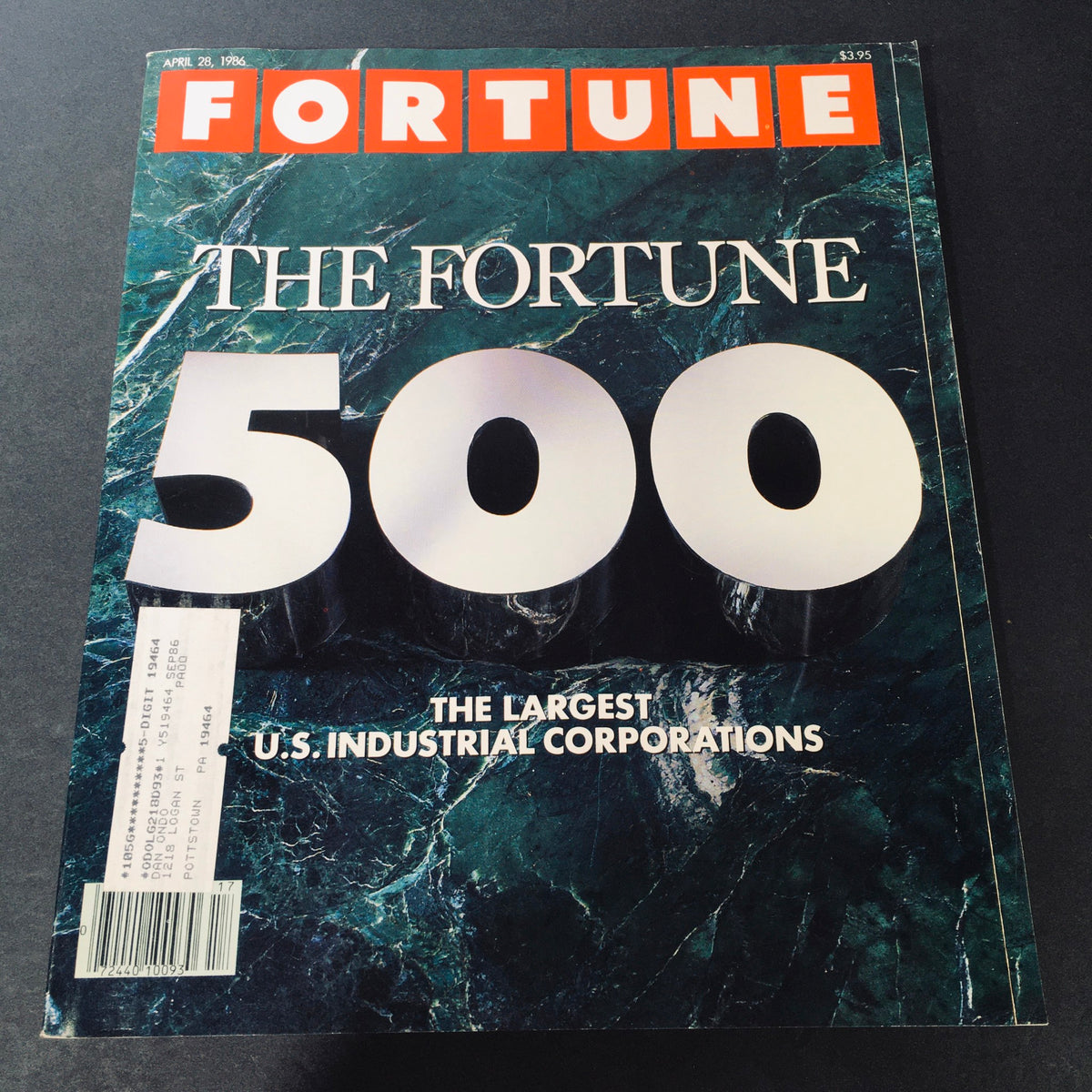 VTG Fortune Magazine April 28 1986 cover featuring 'THE FORTUNE 500' title, highlighting the largest U.S. industrial corporations, with a green marbled background and a vintage address label.