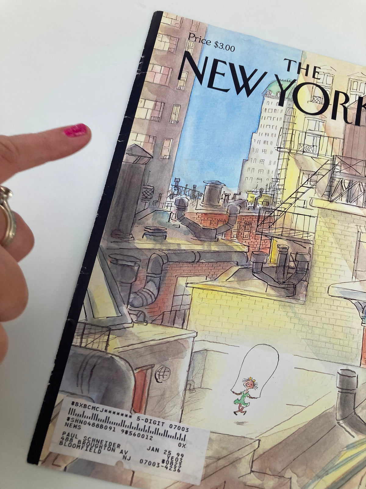 Close-up of The New Yorker cover for October 12, 1998, named 'On the Roof' by Jean-Jacques Sempé, emphasizing the playful urban landscape with a child and various rooftop features.