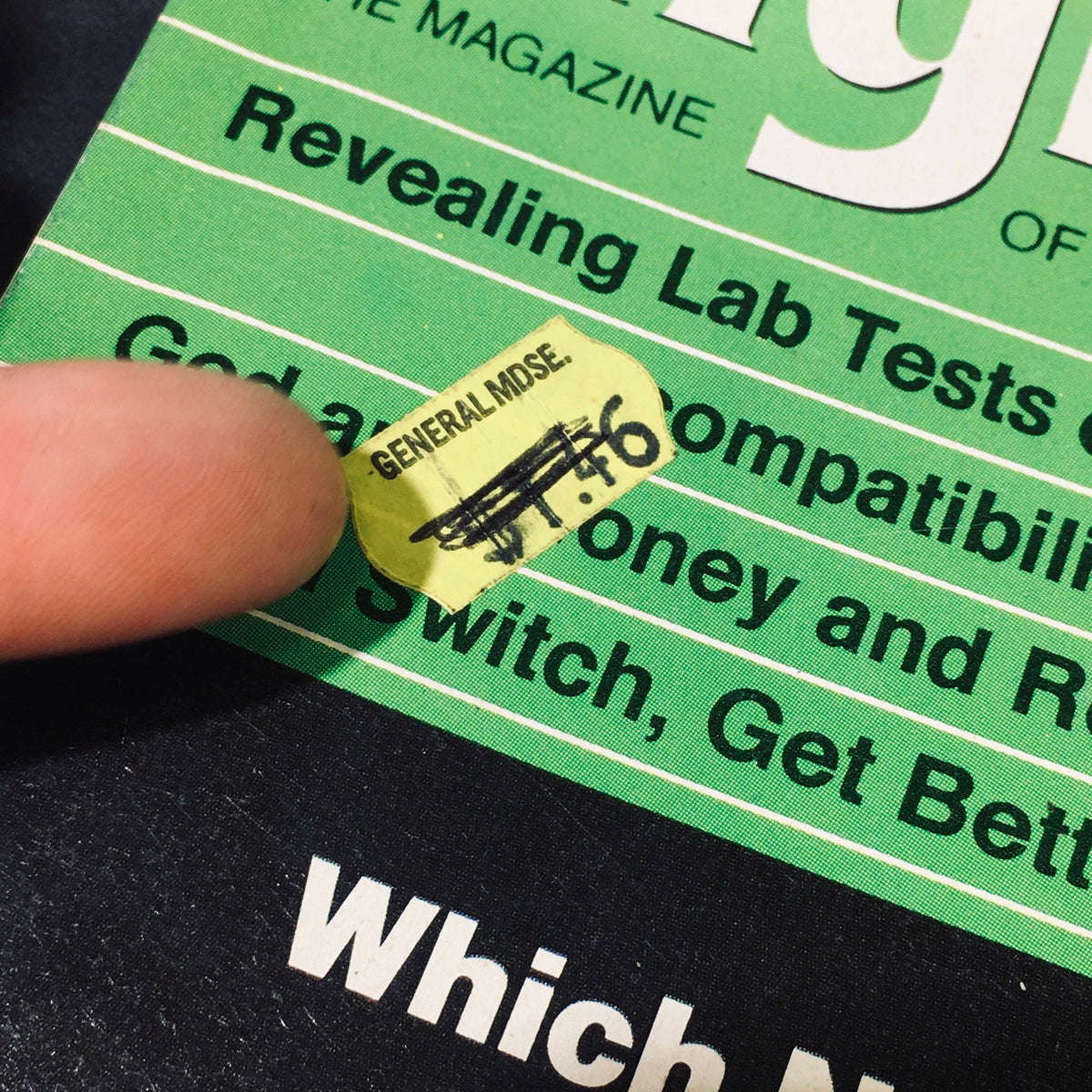 Detail view of a price sticker on the cover of High Fidelity Magazine February 1982 highlighting the vintage pricing and store label.