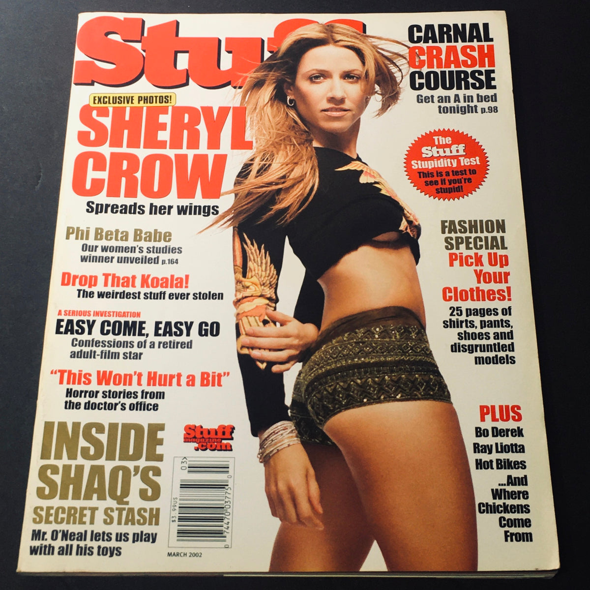 Stuff For Men Magazine March 2002 featuring Cheryl Crow on the cover, showcasing her in a stylish pose with text highlighting various articles, vintage pop culture significance, and collectible aspects.