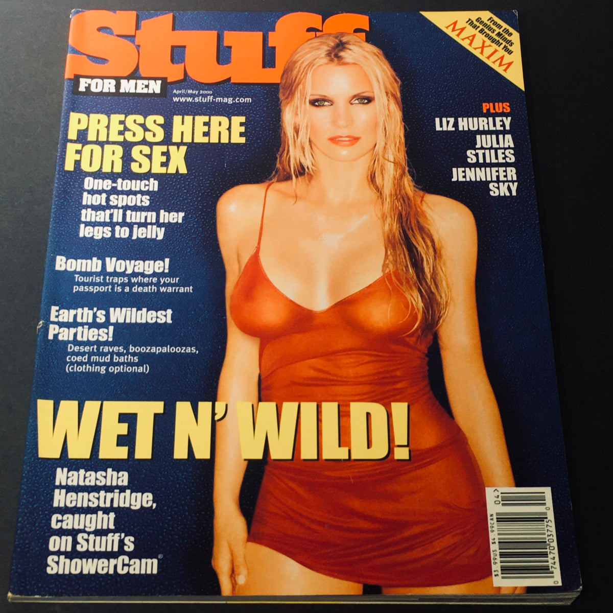 Cover of Stuff For Men Magazine April May 2000 featuring Natasha Henstridge in a red swimsuit, highlighting the magazine's focus on pop culture and lifestyle trends of the early 2000s.
