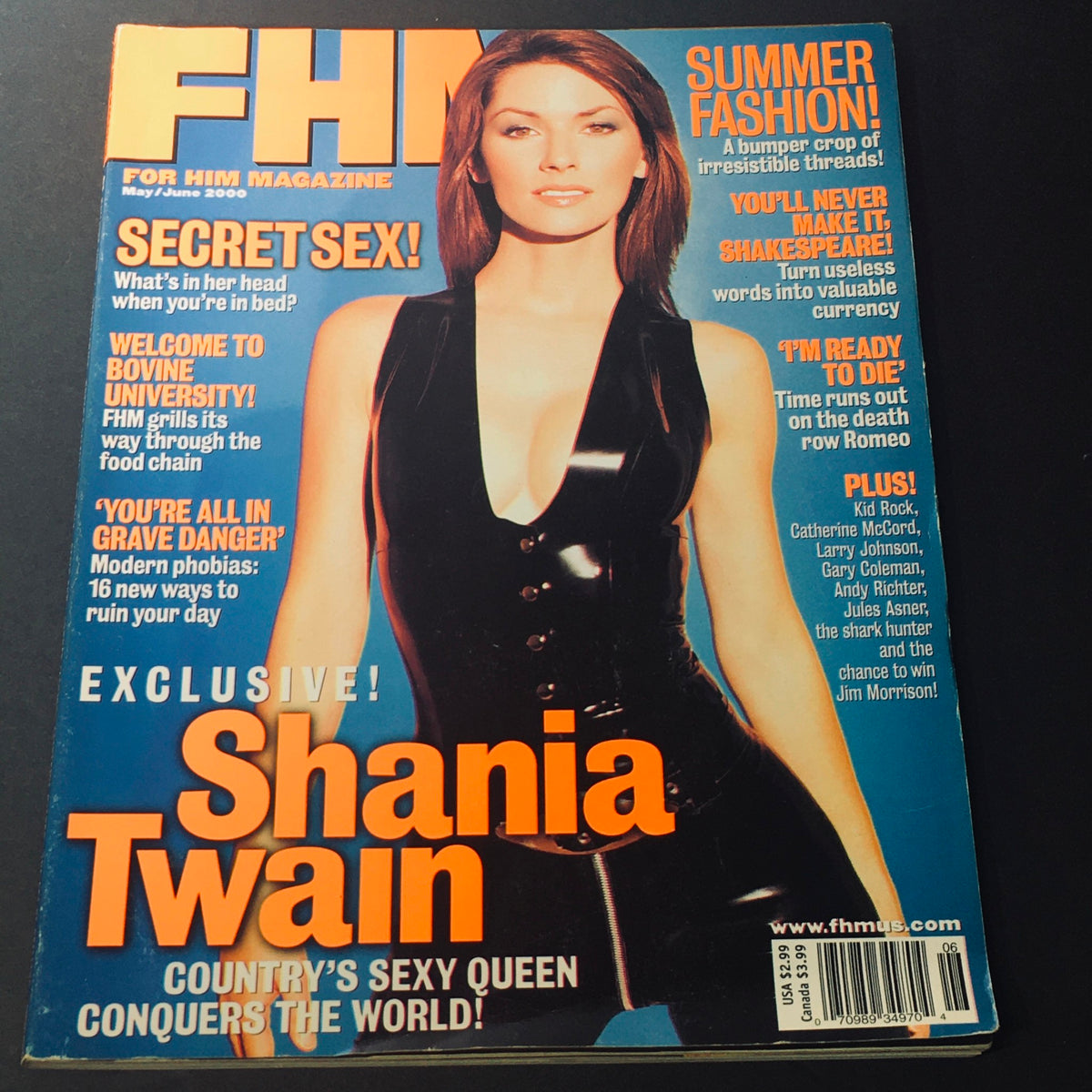 FHM Magazine May June 2000 featuring Shania Twain on the cover, titled 'Country's Sexy Queen', showcasing her in a stylish black outfit.