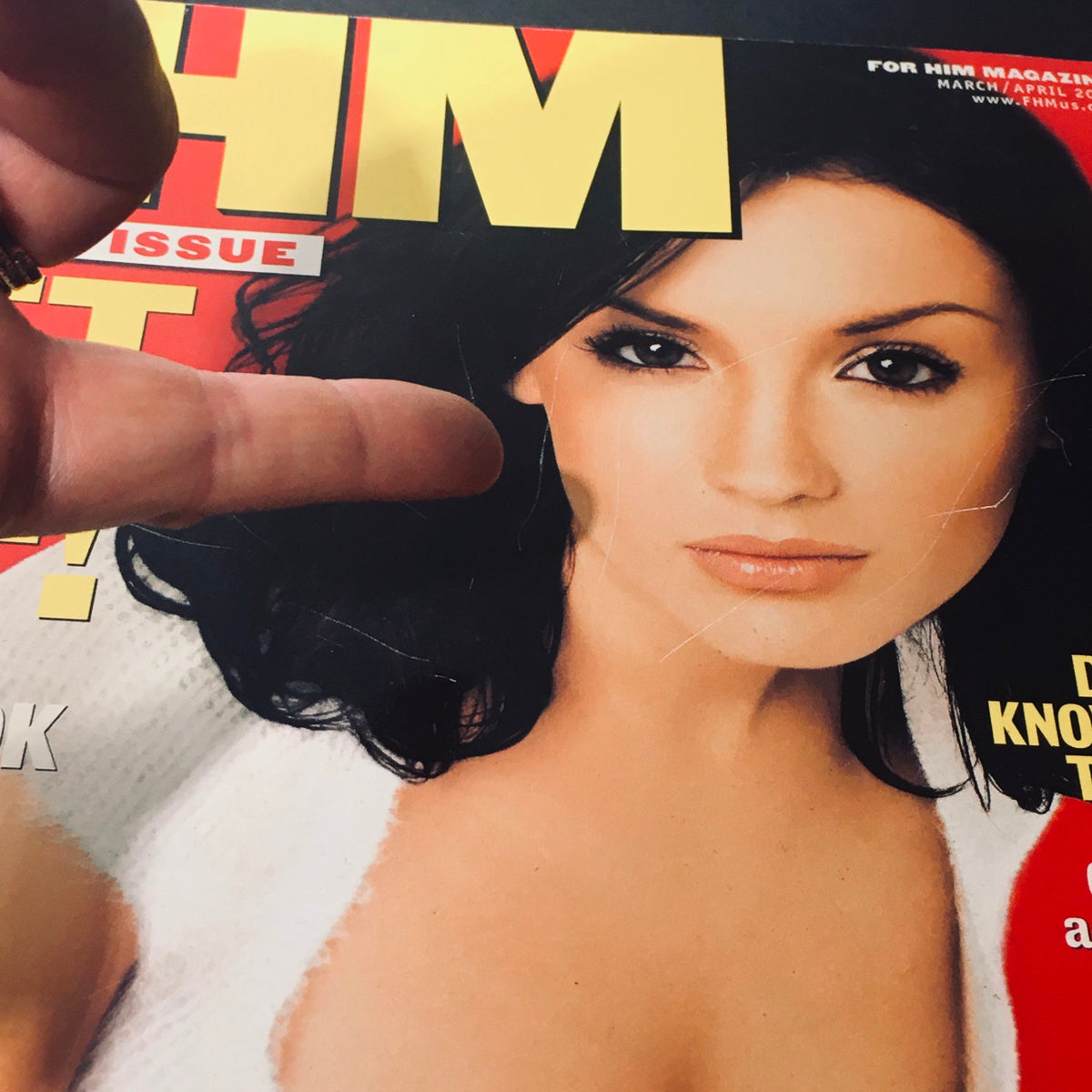 Close-up detail of FHM Magazine March April 2000 cover highlighting Rachel Leigh Cook's image and magazine features for vintage magazine collectors.