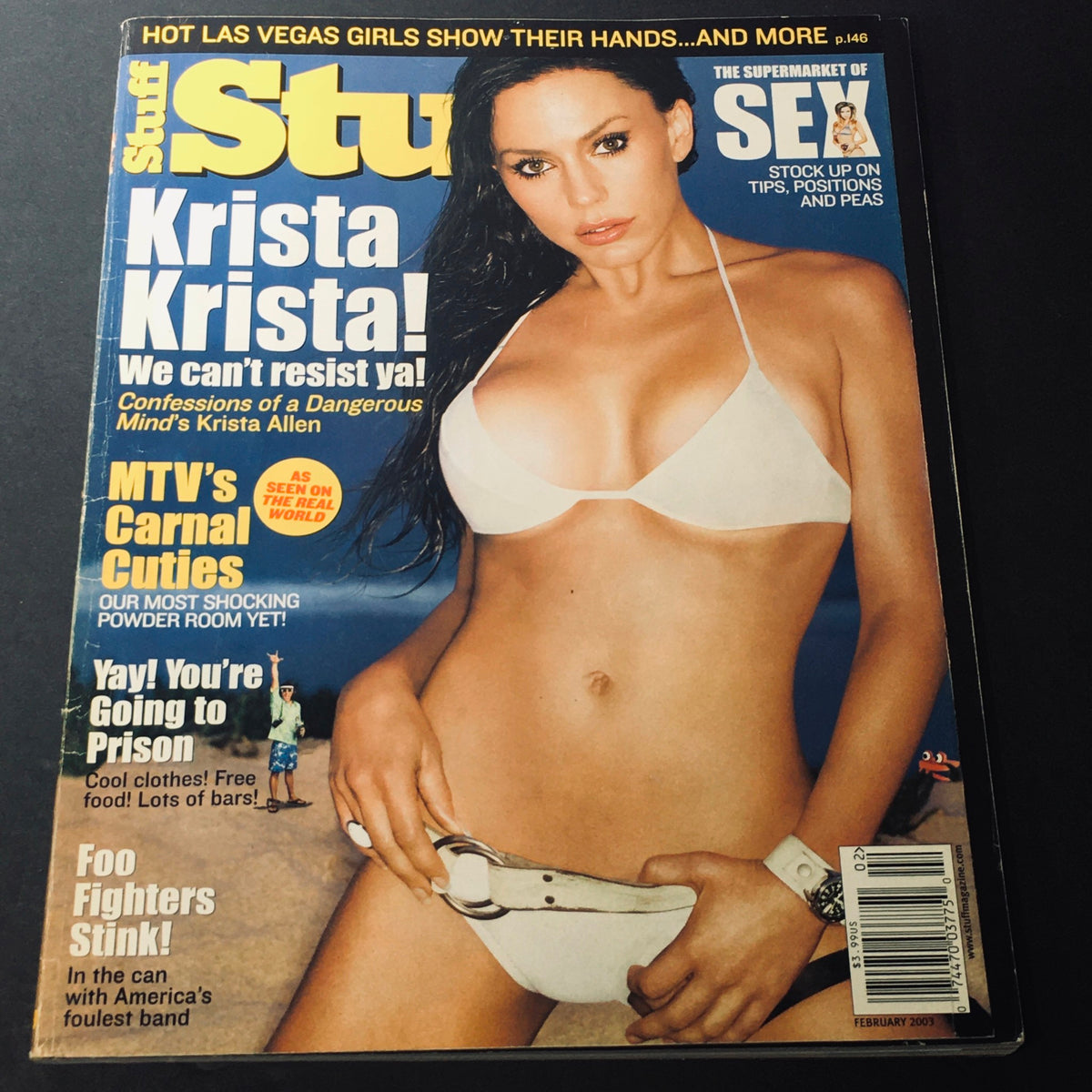 Cover of Stuff For Men Magazine February 2003 featuring Krista Allen in a white bikini, highlighting her revealing confession. This vintage magazine illustrates men's culture from the early 2000s.