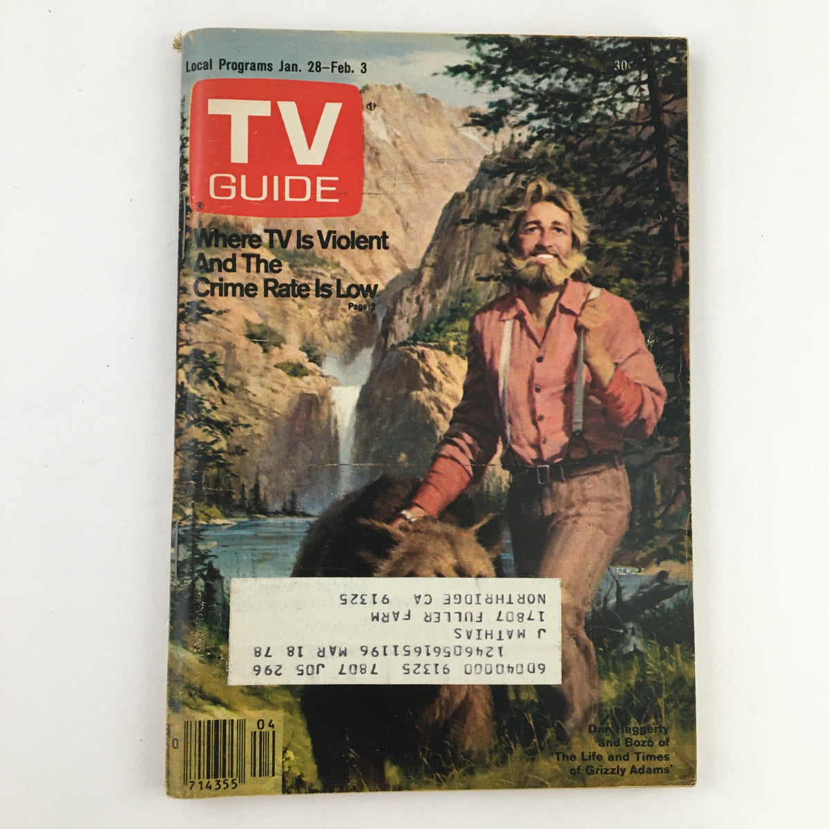 TV Guide Magazine January 28 1978 cover featuring Dan Haggerty and Bozo the Clown, showcasing a scenic backdrop with a waterfall and forest. The magazine highlights content about television programming and cultural trends of the era.
