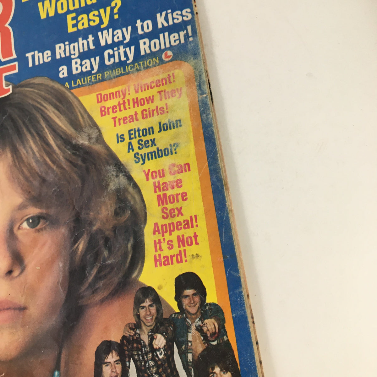 Side view of Tiger Beat Magazine February 1976, illustrating the vibrant colors and iconic branding of the magazine.
