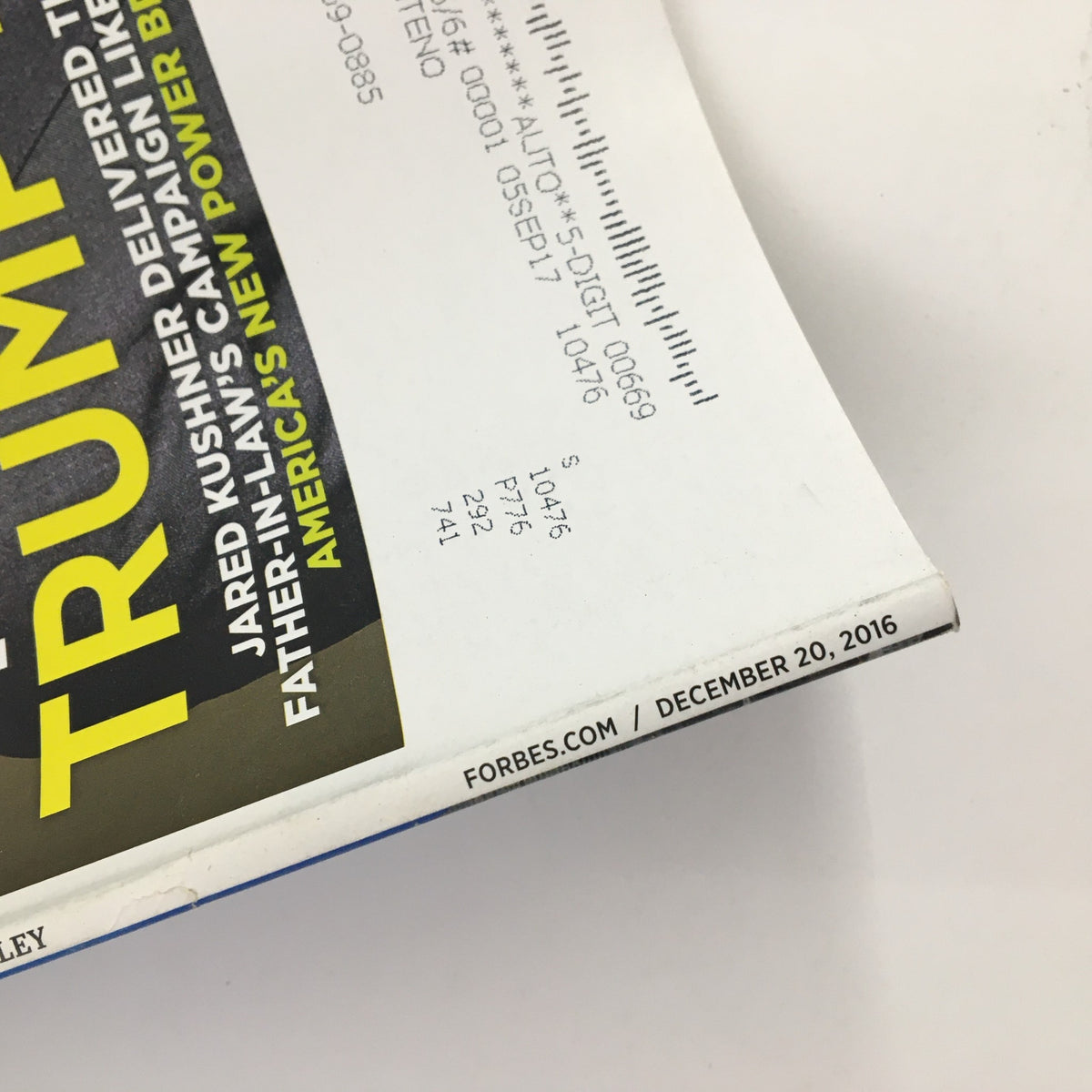 Close-up of the spine of Forbes Magazine December 20 2016, showcasing the publication date and branding, emphasizing its collectible status and relevance in American politics.