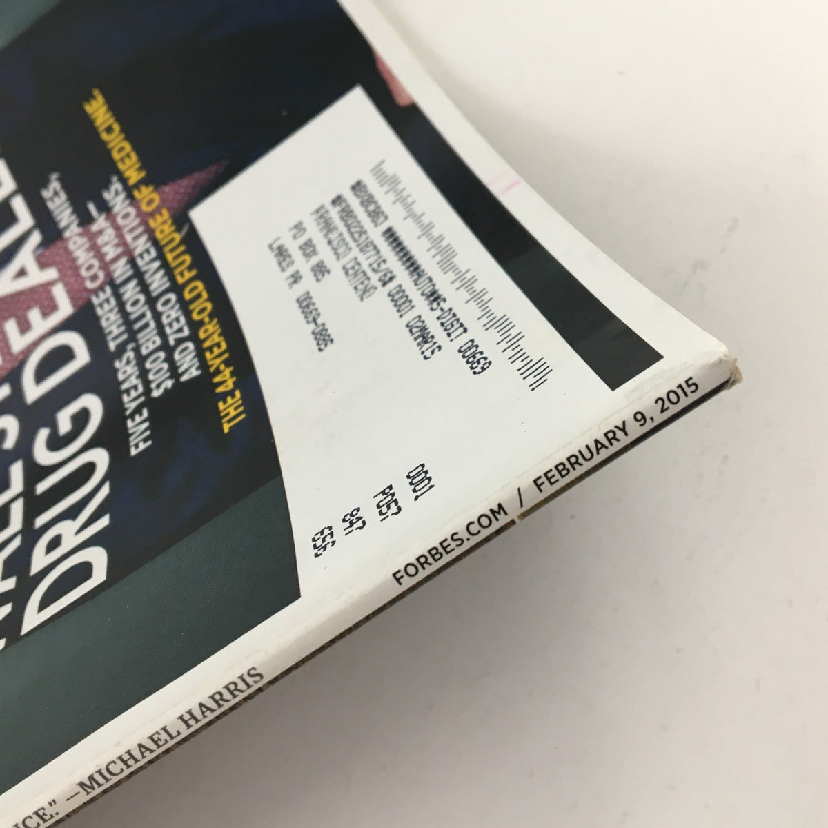 Close-up view of the spine and details of Forbes Magazine February 9, 2015, showcasing the publication's date and edition information.