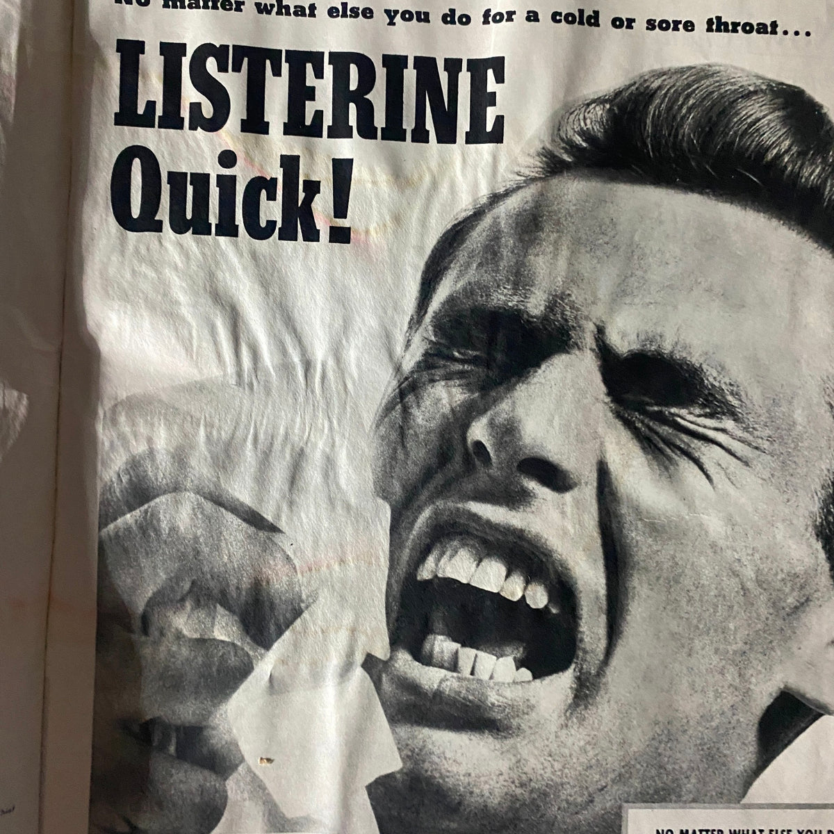 Advertisement page in Collier's Magazine March 30, 1956, featuring a vintage Listerine ad with a man visibly expressing urgency, reflecting the advertising aesthetics of the 1950s.