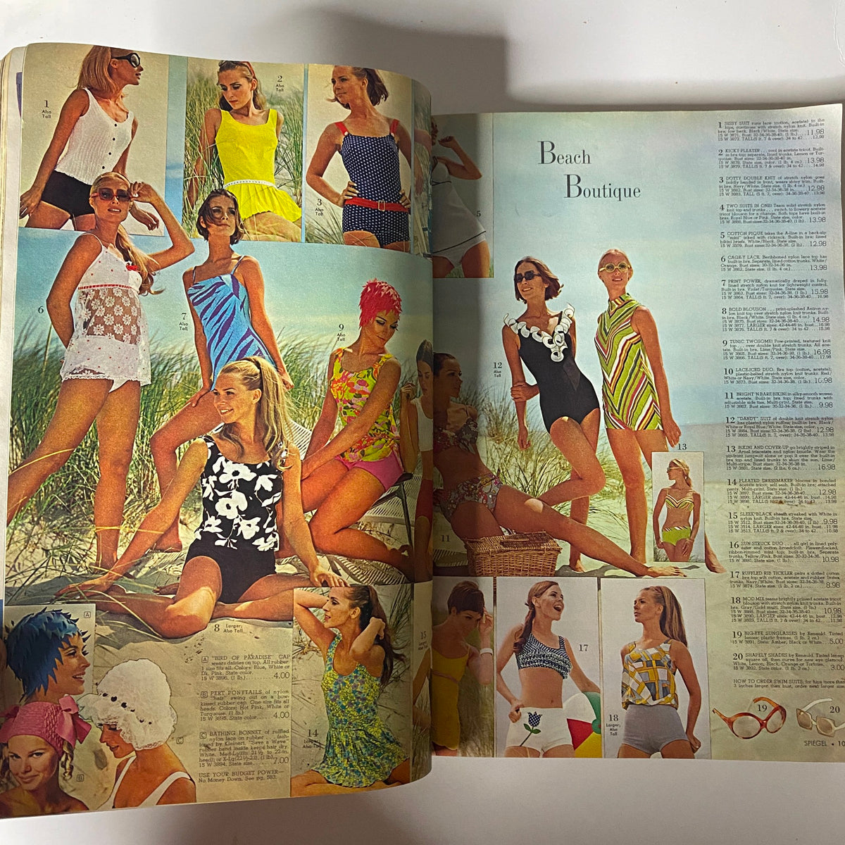 1969 Spiegel Spring and Summer Catalog featuring a vibrant 'Beach Boutique' section showcasing women in various stylish swimsuits and beach attire, highlighting colorful patterns and summer fashion trends from the era.