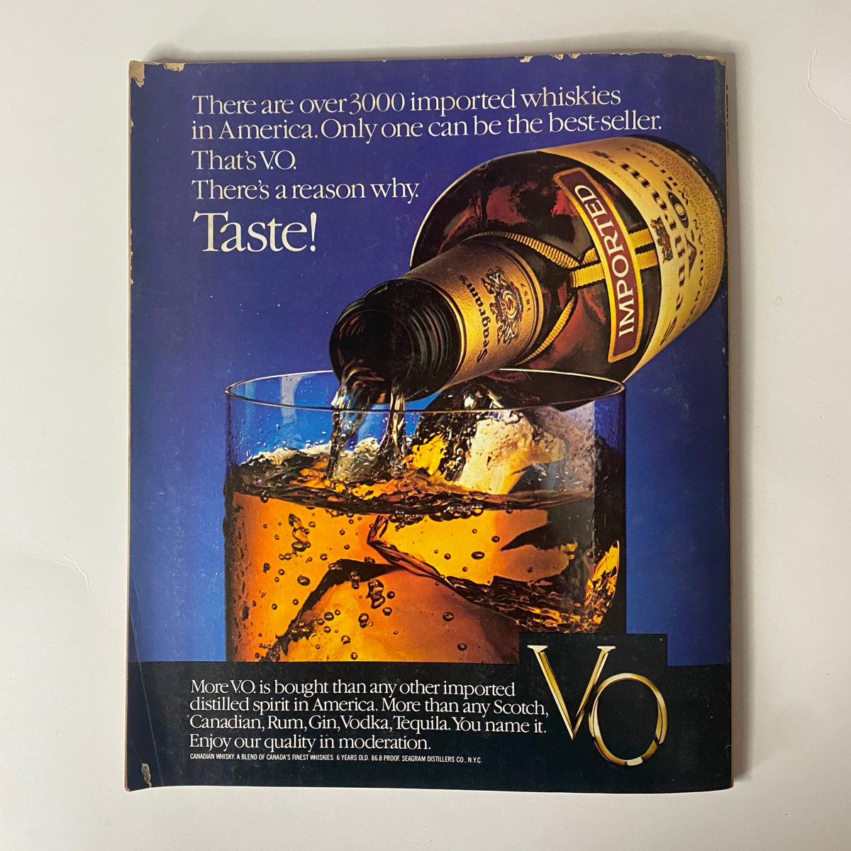 Advertisement for VO whiskey from Fortune Magazine, showcasing a bottle pouring into a glass with the tagline highlighting its distinction as the best-selling imported whiskey in America.