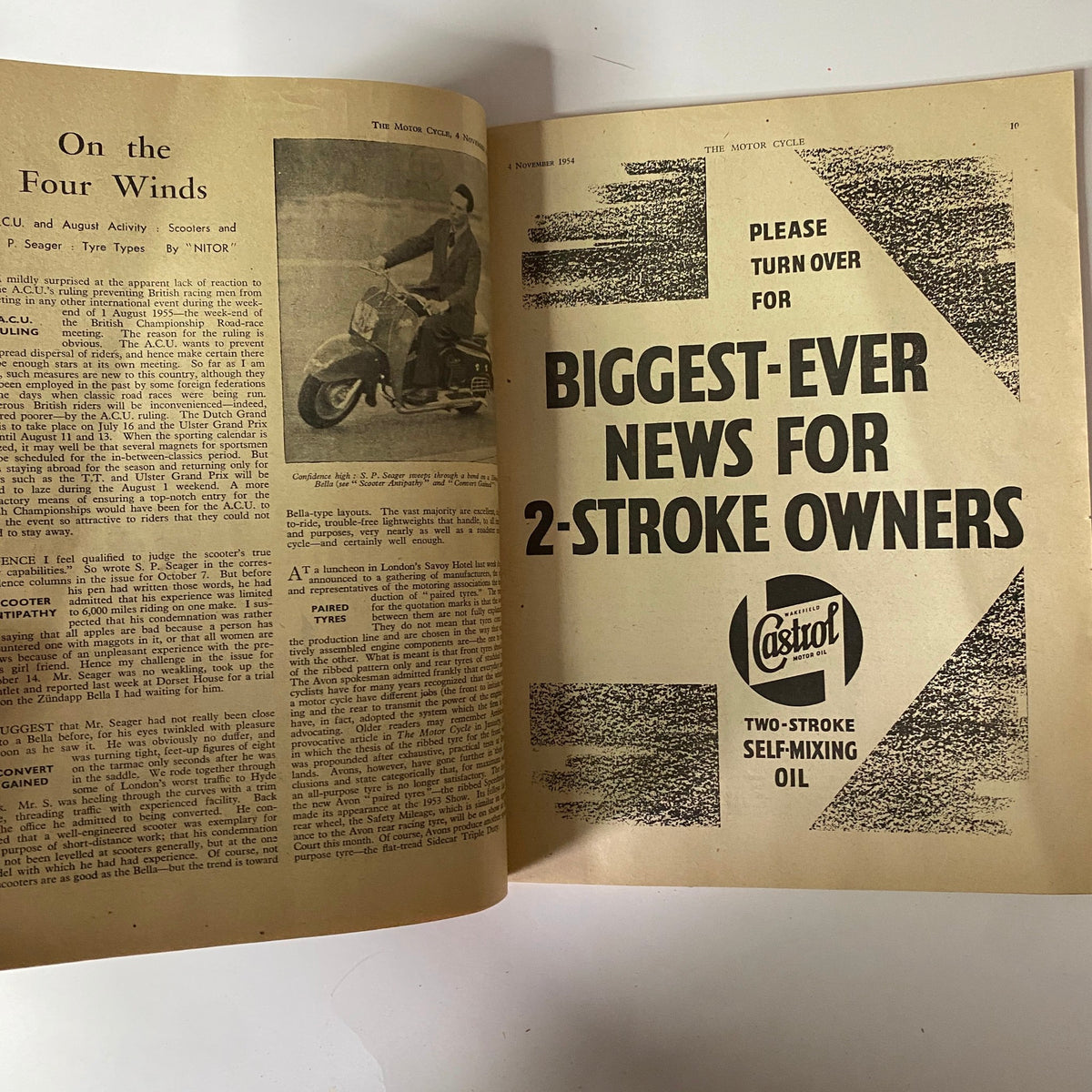 Two-page spread from The Motor Cycle Magazine November 4, 1954, displaying the editorial feature 'On the Four Winds' along with an advertisement for a two-stroke self-mixing oil.
