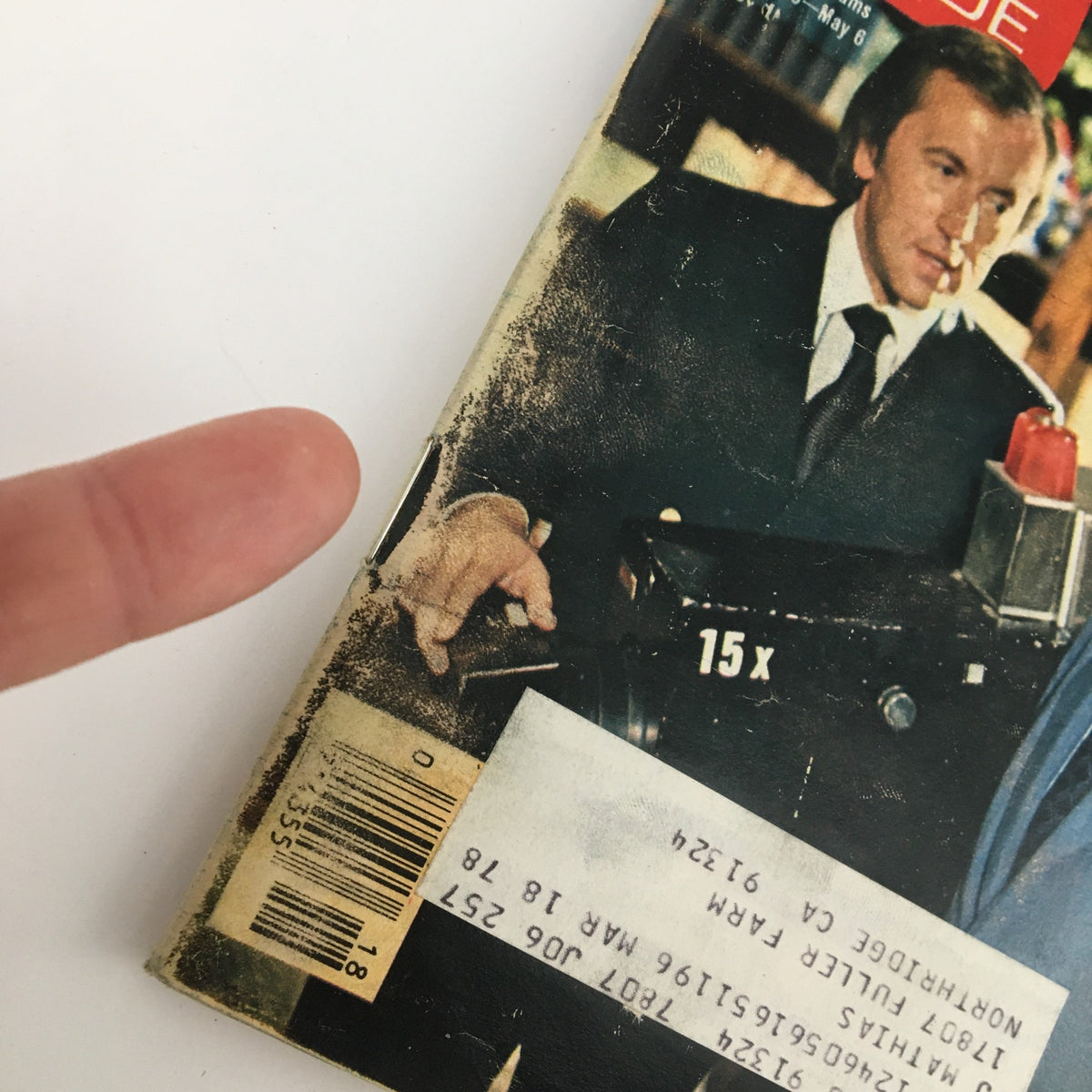 Close-up of the cover showing TV Guide Magazine April 30 1977 with David Frost and Richard Nixon, featuring minor wear and an address label.