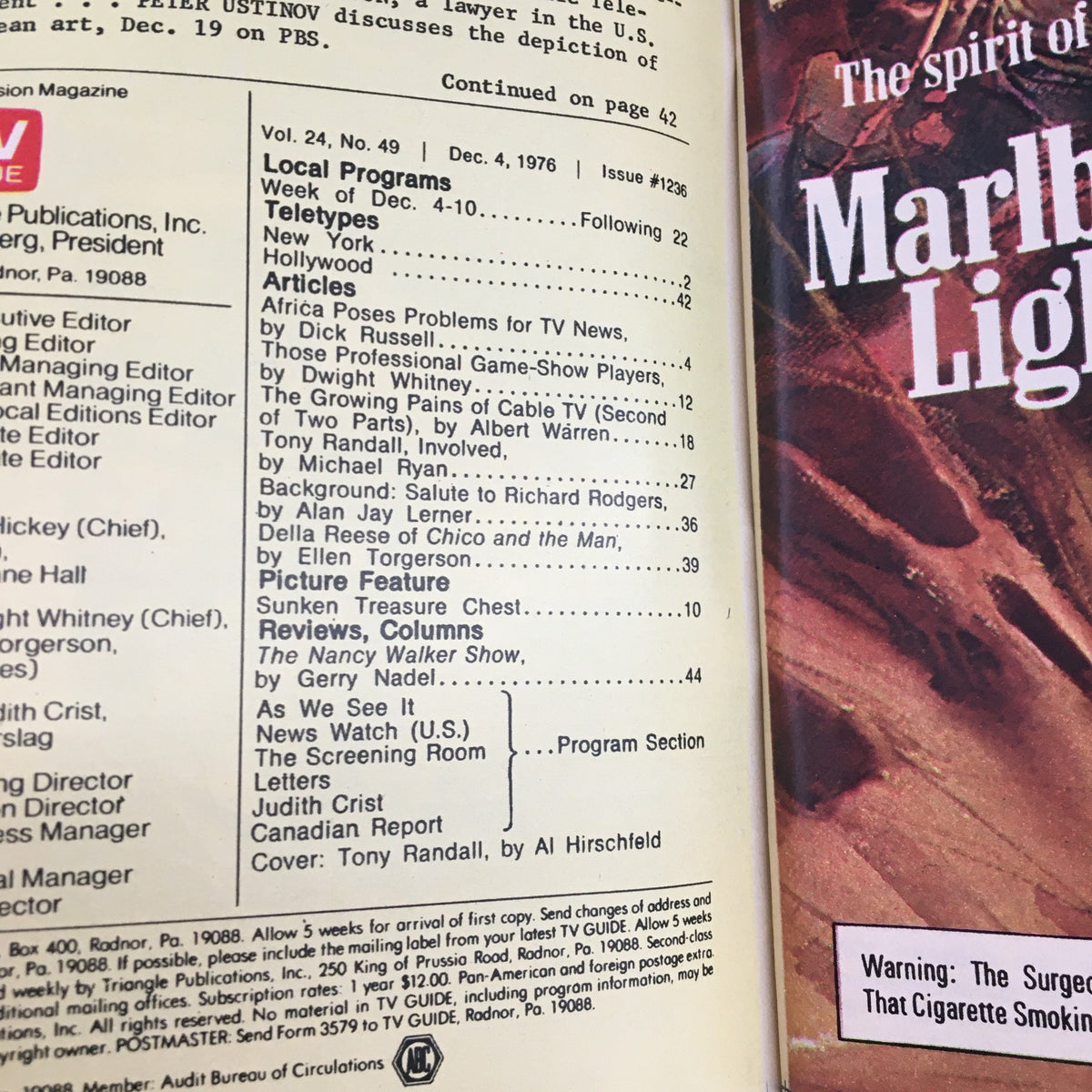 Inside page of TV Guide Magazine December 4, 1976 showcasing a table of contents with article titles including 'Africa Poses Problems for TV News' and mentions of notable personalities like Tony Randall.