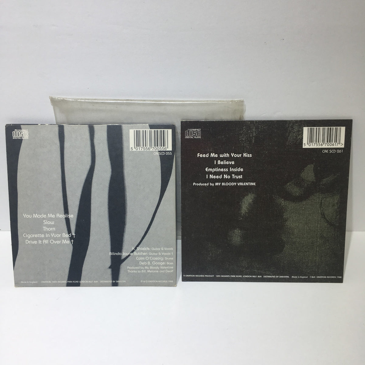 Back cover of You Made Me Realise & Feed Me With Your Kiss EP by My Bloody Valentine Audio CD, showcasing track titles and production details.