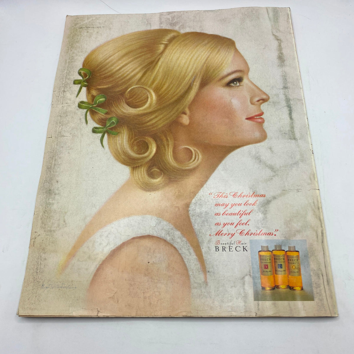 Vintage beauty advertisement from the VTG McCall's Magazine December 1967 featuring a woman with elegant hairstyle and a Christmas greeting.