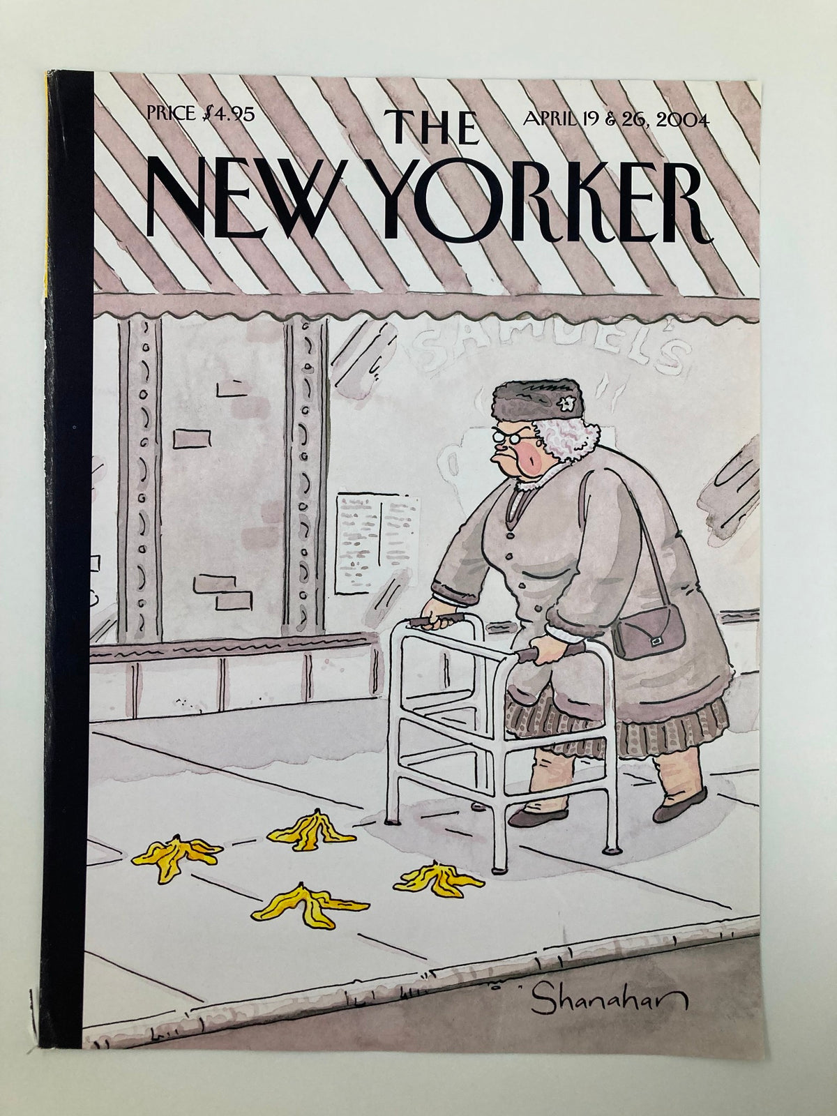 The New Yorker cover for April 19, 2004, showcasing 'Slip on Bananas' by Danny Shanahan, illustrating an older woman with a walker cautiously navigating a humorous scene with banana peels.