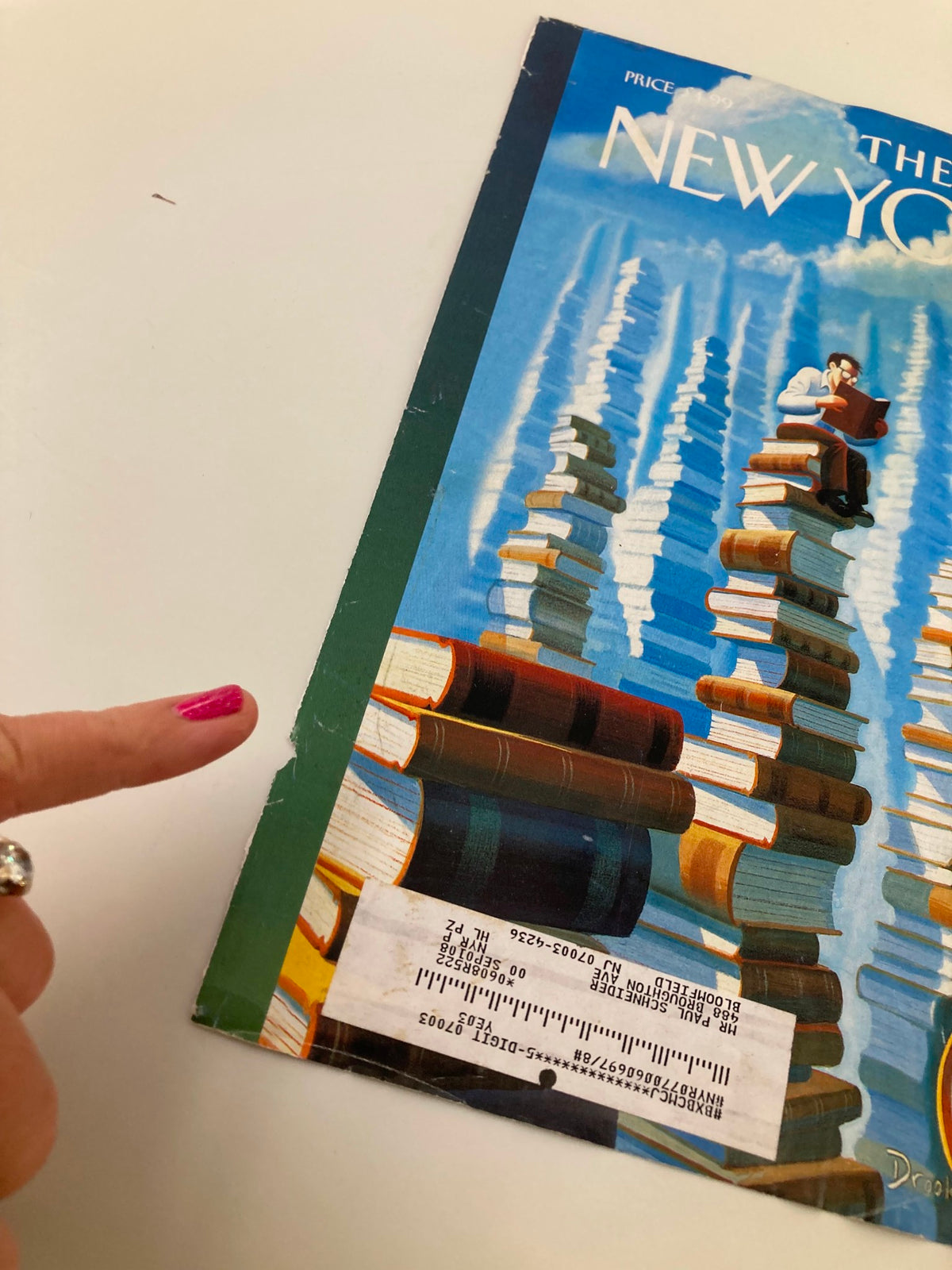 COVER ONLY The New Yorker November 6 2006 by Eric Drooker, capturing details of the magazine cover highlighting a man reading among stacks of colorful books, with minor wear visible.