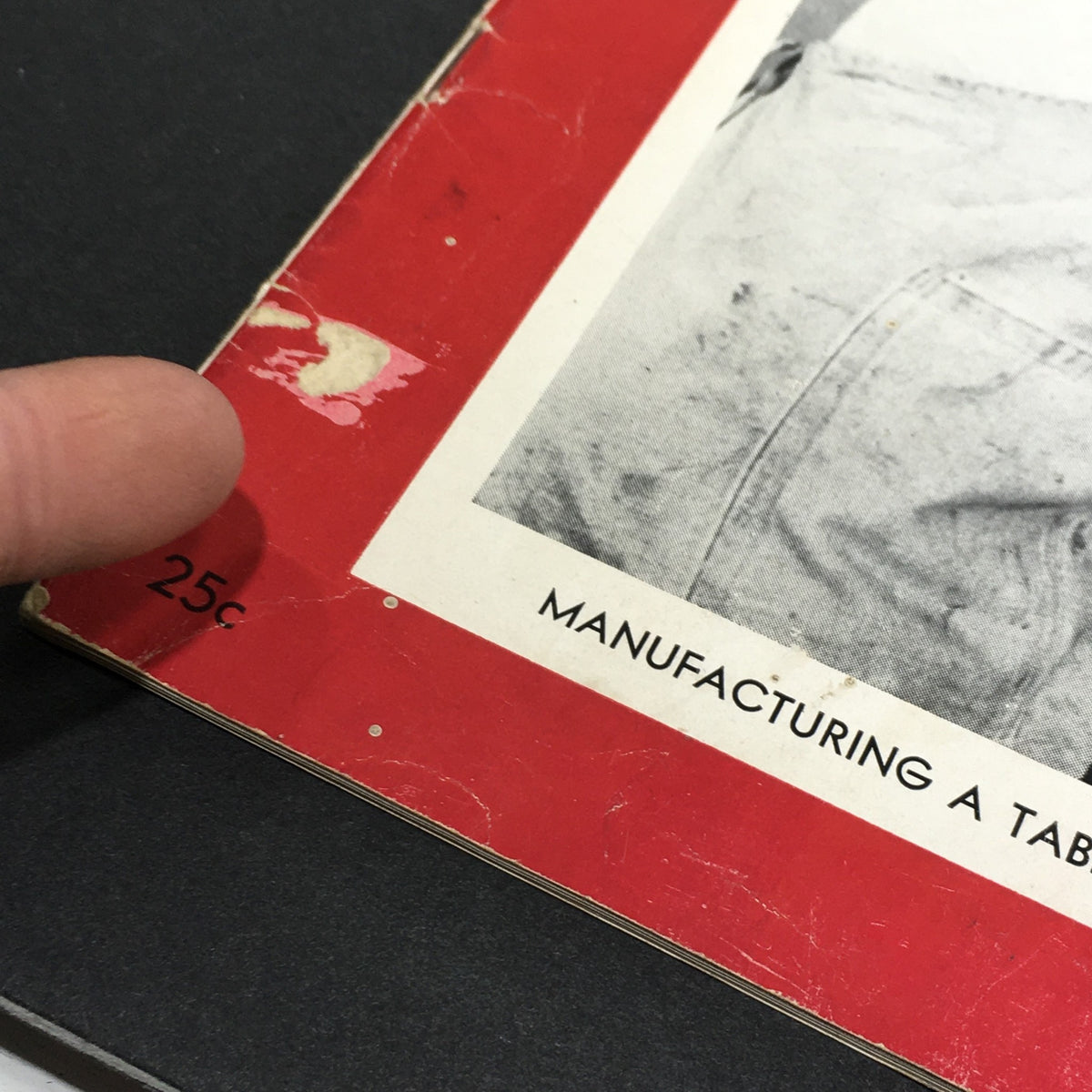Close-up view of the VTG Achievement Magazine March 1948 cover, showing details of the corner with the price and condition wear, emphasizing its vintage authenticity.