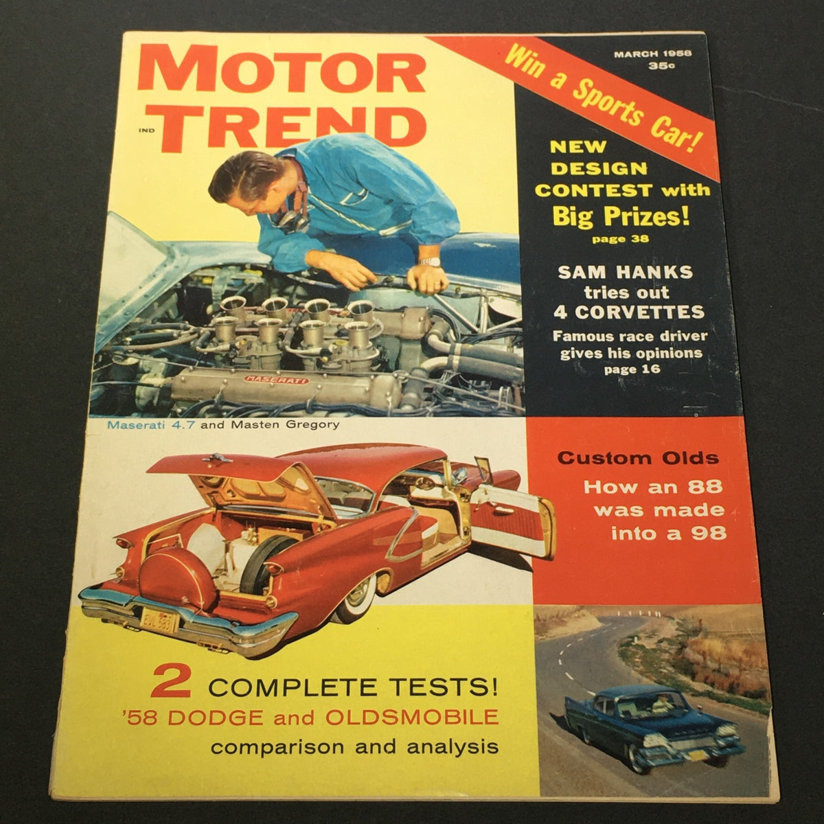 Cover of VTG Motor Trend Magazine March 1958 featuring a mechanic inspecting a Maserati engine, with a vintage design showcasing a comparison of the 1958 Dodge and Oldsmobile models.