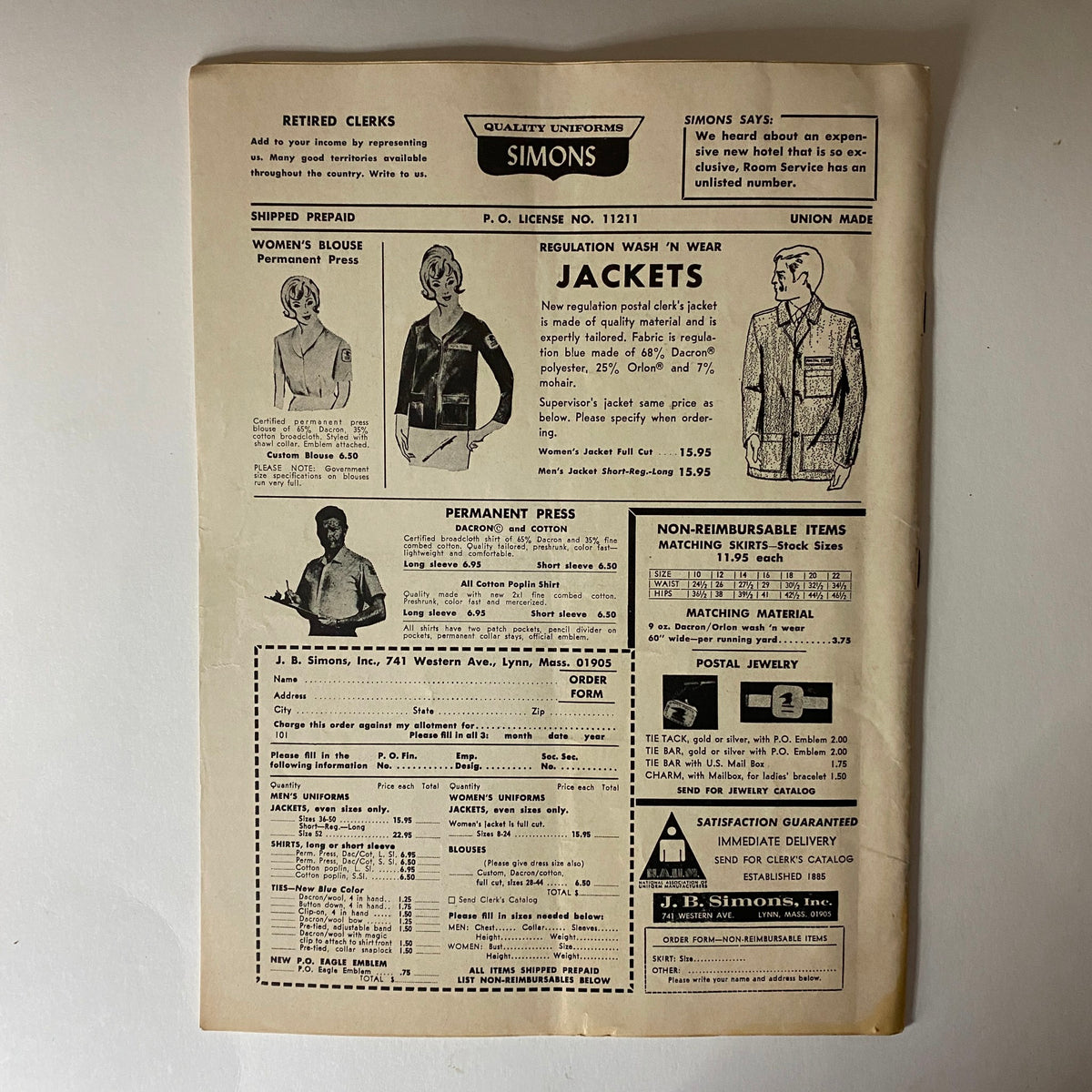 Back page of The American Postal Worker Magazine - October 1971 showcasing uniform advertisements for postal workers including jackets and blouses.