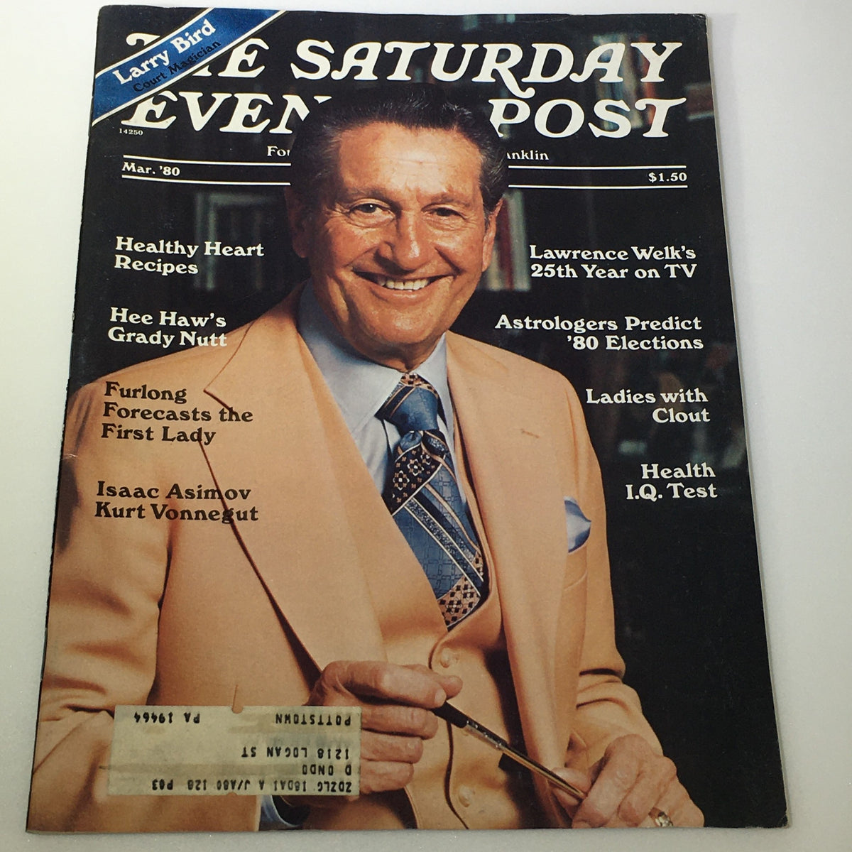 Vintage magazine cover of The Saturday Evening Post from May 1980 featuring Larry Bird and Hee Haw's Grady Nutt, showcasing the iconic style of the era.
