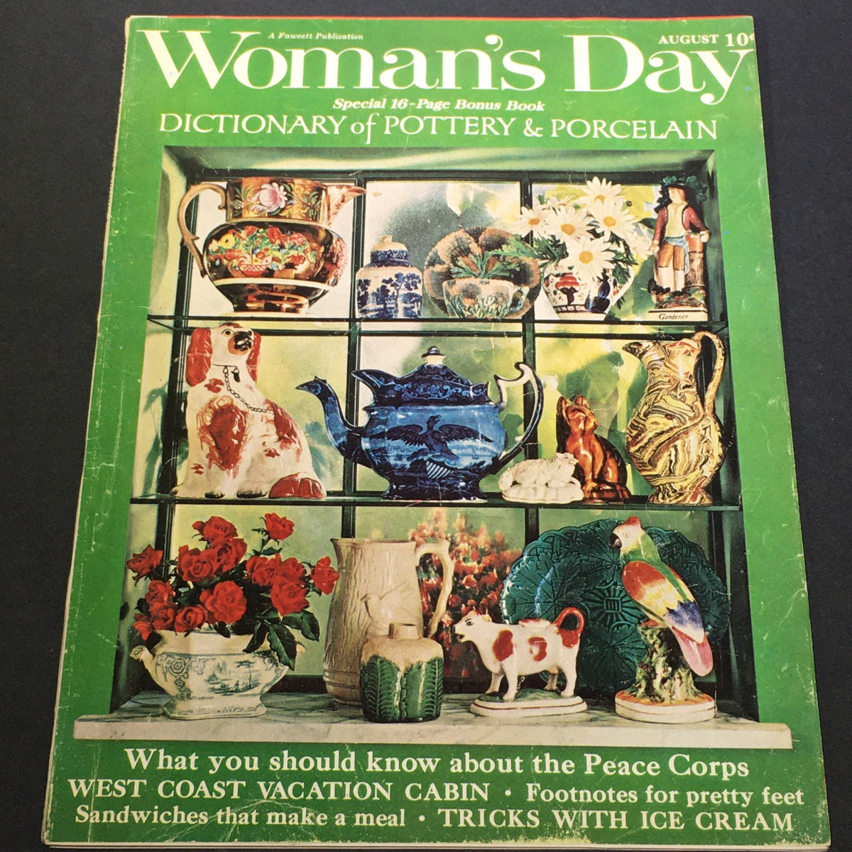 VTG Woman's Day Magazine August 1962 cover featuring a 'Dictionary of Pottery and Porcelain' with colorful ceramic collection.