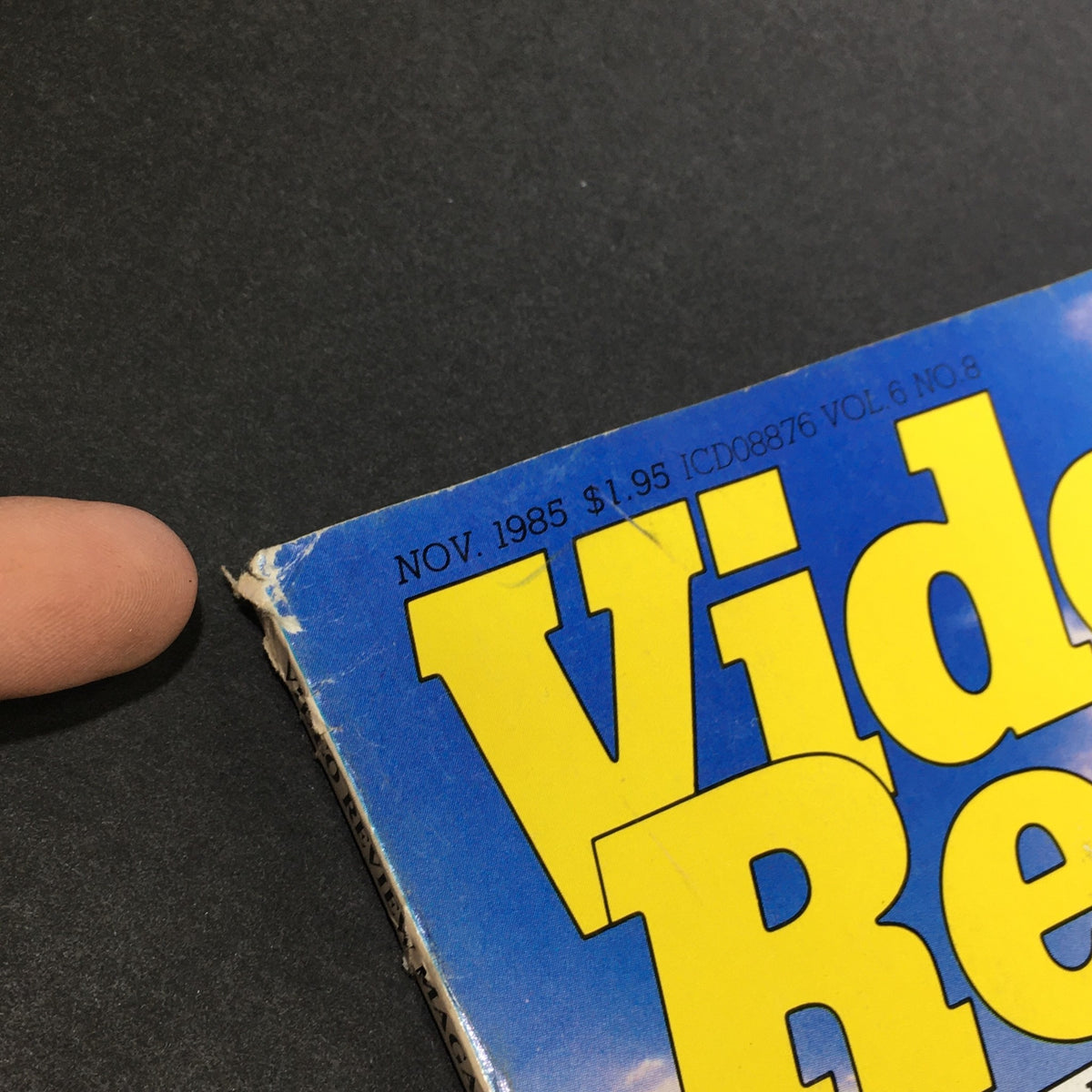 Close-up of the spine of the VTG Video Review Magazine November 1985, displaying its publication details and notable title, a collectible from the mid-80s entertainment scene.
