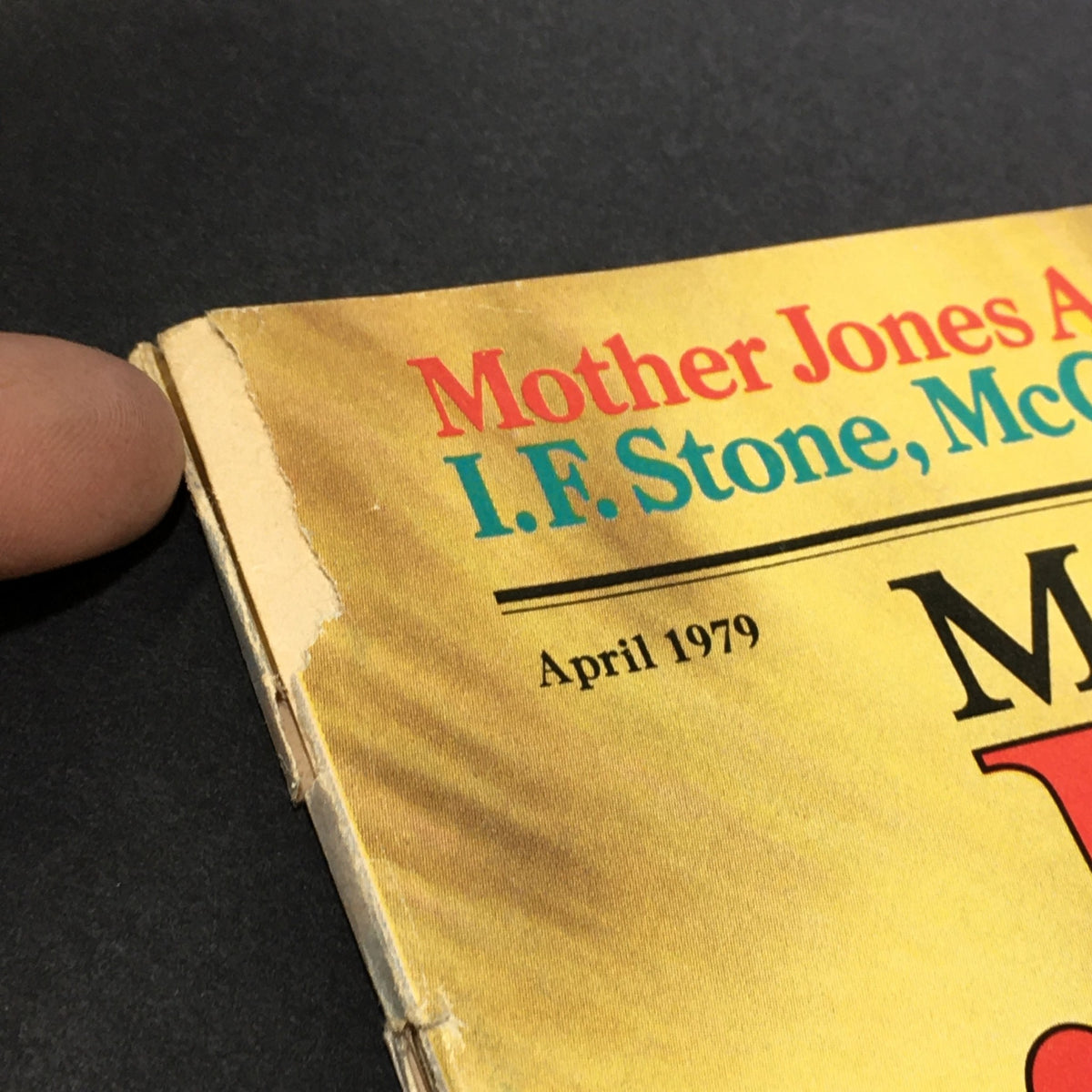 Close-up of the April 1979 issue cover of Mother Jones magazine featuring Joseph McCarthy, Noam Chomsky, and I.F. Stone, illustrating minor wear on the edges.
