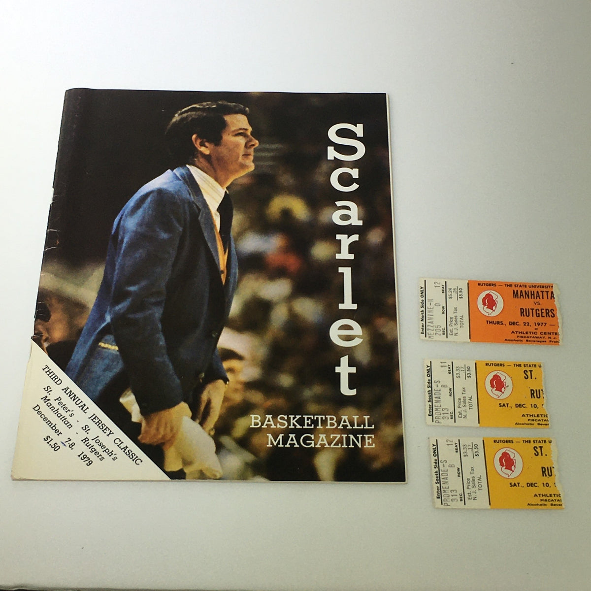 VTG NCAA Rutgers Scarlet Knights Basketball Magazine December 7-8 1978 featuring a vintage cover photograph of a coach and original game tickets displayed alongside.