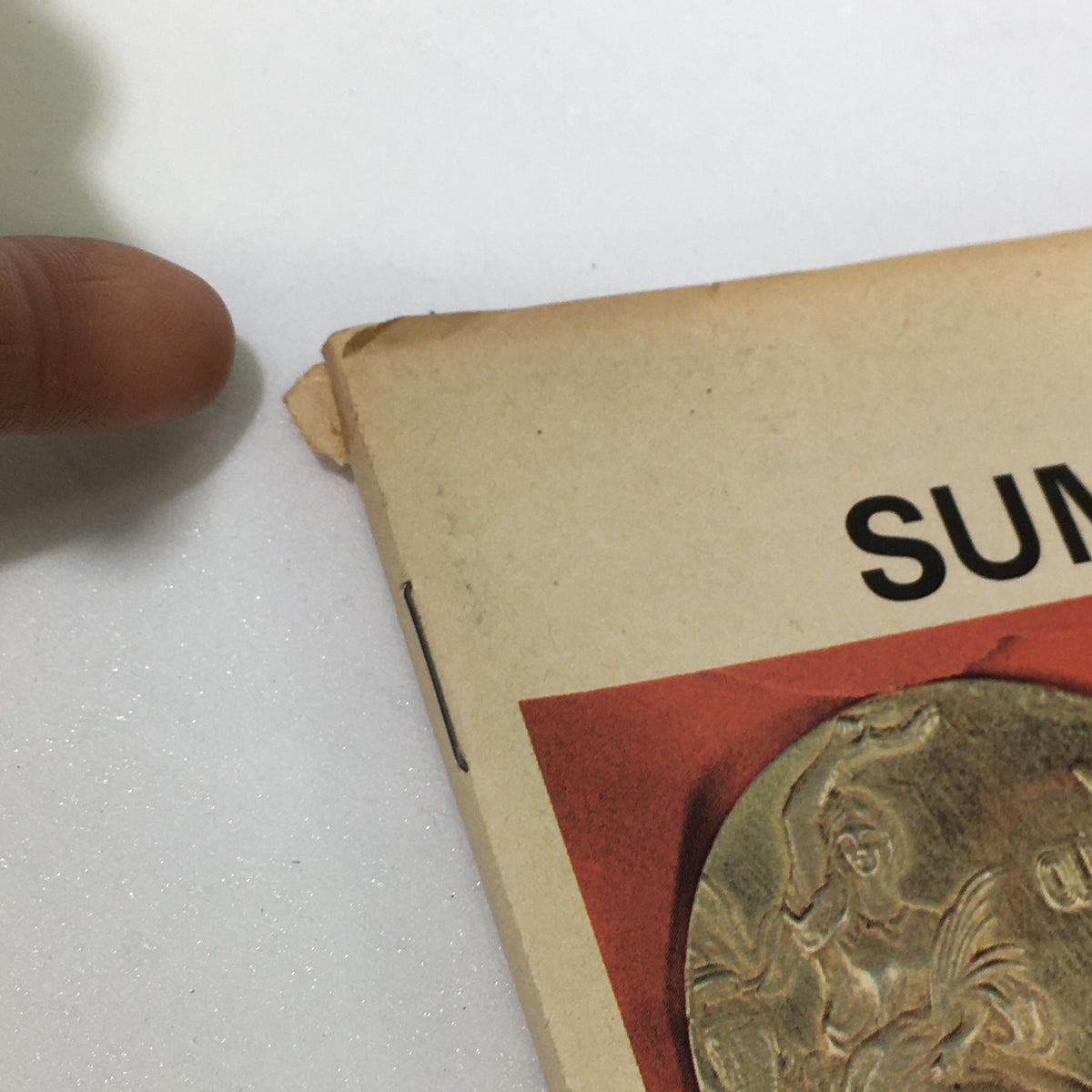 Corner detail of the VTG 1972 The Summer Olympic Games magazine cover featuring the XIX Olympiad Gold Medal.