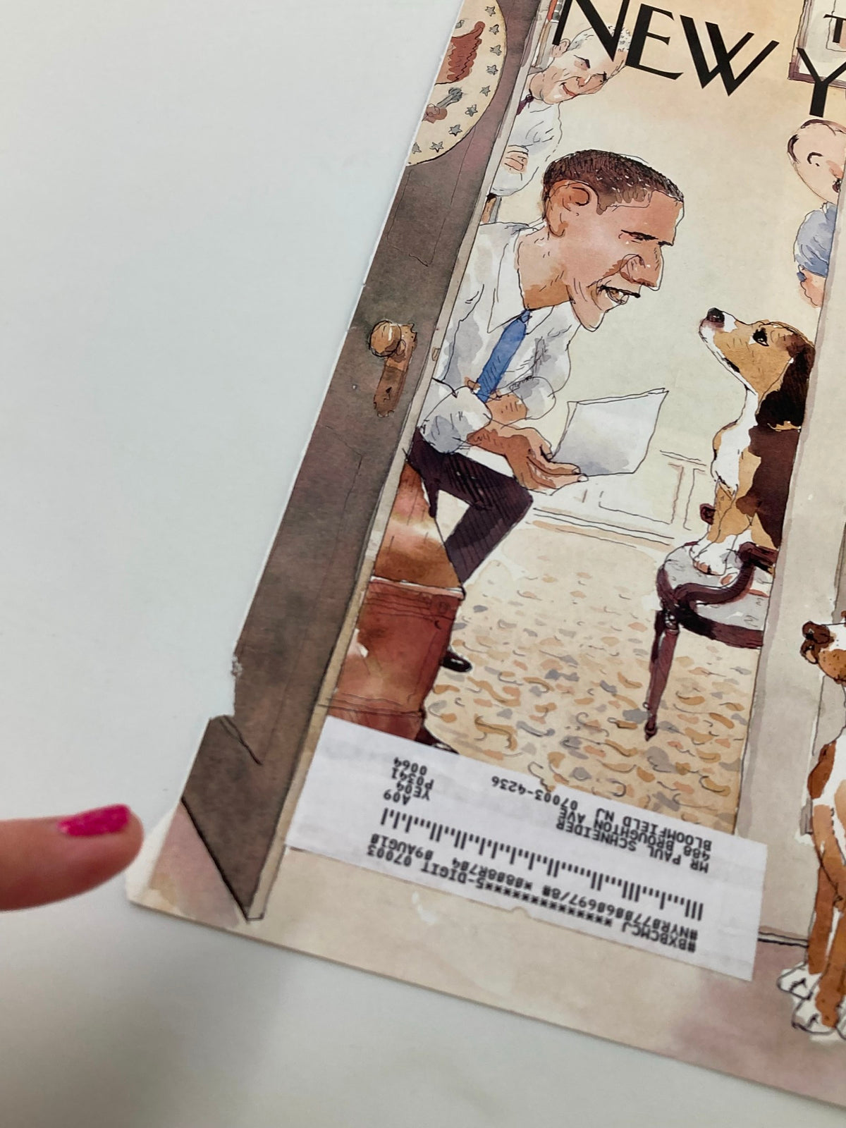 Close-up of the New Yorker magazine cover from December 8, 2008, depicting Barack Obama with dogs in a playful illustration by Barry Blitt.