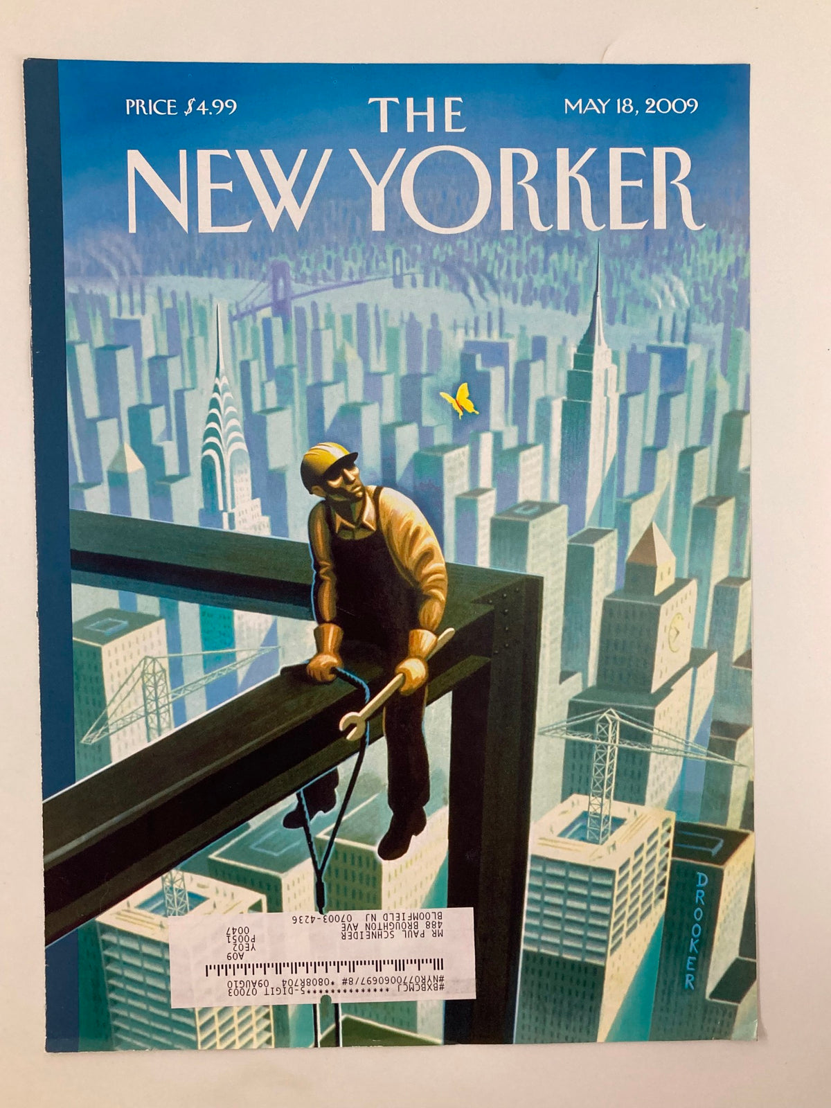 Cover of The New Yorker from May 18, 2009, titled 'Coming Up For Air' by Eric Drooker, showcasing a dramatic cityscape and a worker on a beam with a yellow bird.