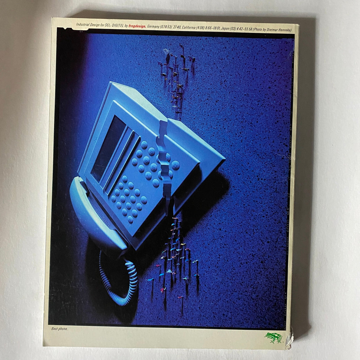 Cover page of VTG I.D. Magazine July - August 1988 Annual Design Review featuring a striking image of a cracked telephone against a blue background, representing innovative design.