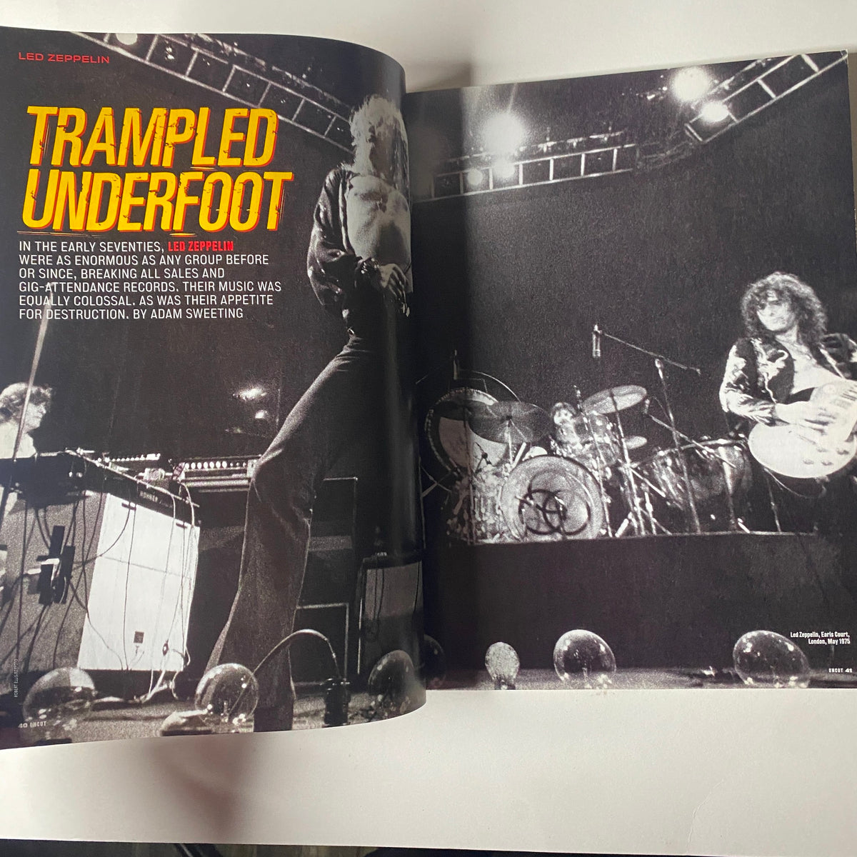 Inside spread from Uncut UK Magazine July 2002 featuring Led Zeppelin. The article titled 'Trampled Underfoot' discusses Led Zeppelin's prominence in the early seventies and includes live performance imagery.