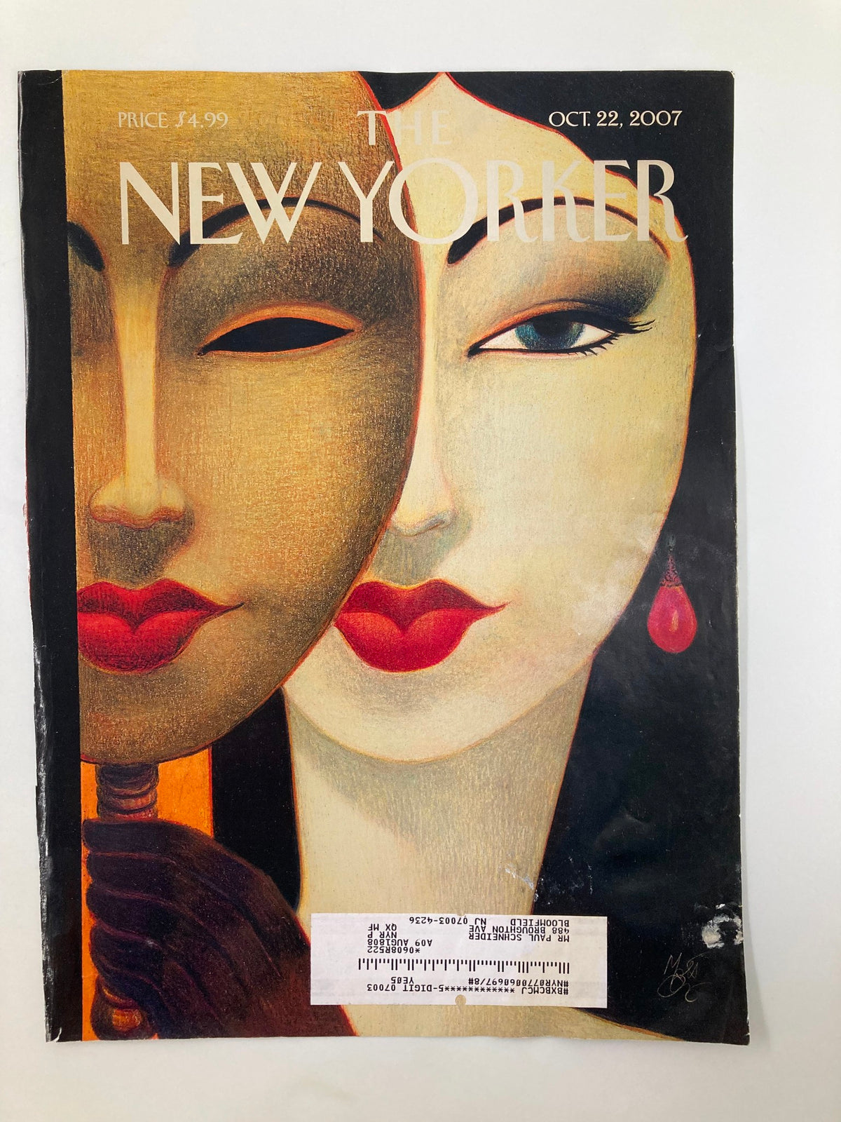 Cover only The New Yorker October 22 2007 depicting dual faces by Lorenzo Mattotti, highlighting vibrant colors and elegant design elements.