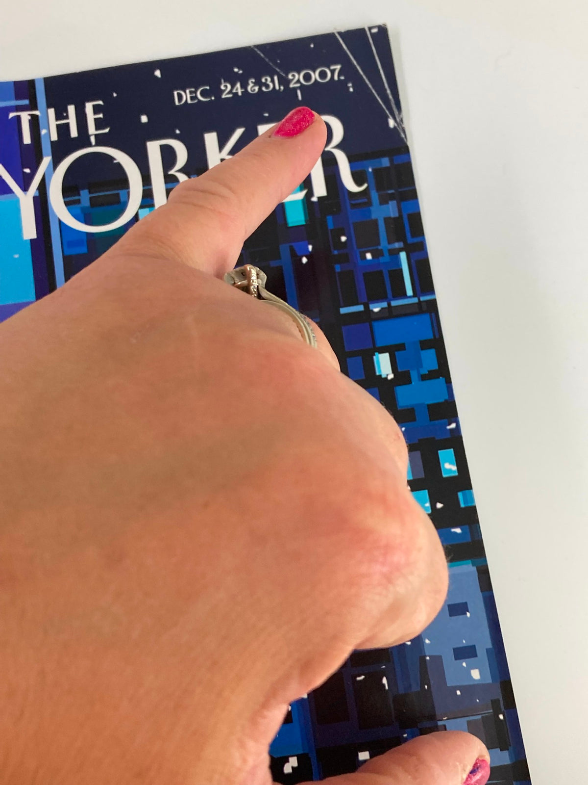 COVER ONLY The New Yorker December 24 & 31 2007, featuring a close-up of a hand pointing to the magazine cover, showcasing the artwork themed around climate change by Kim DeMarco.