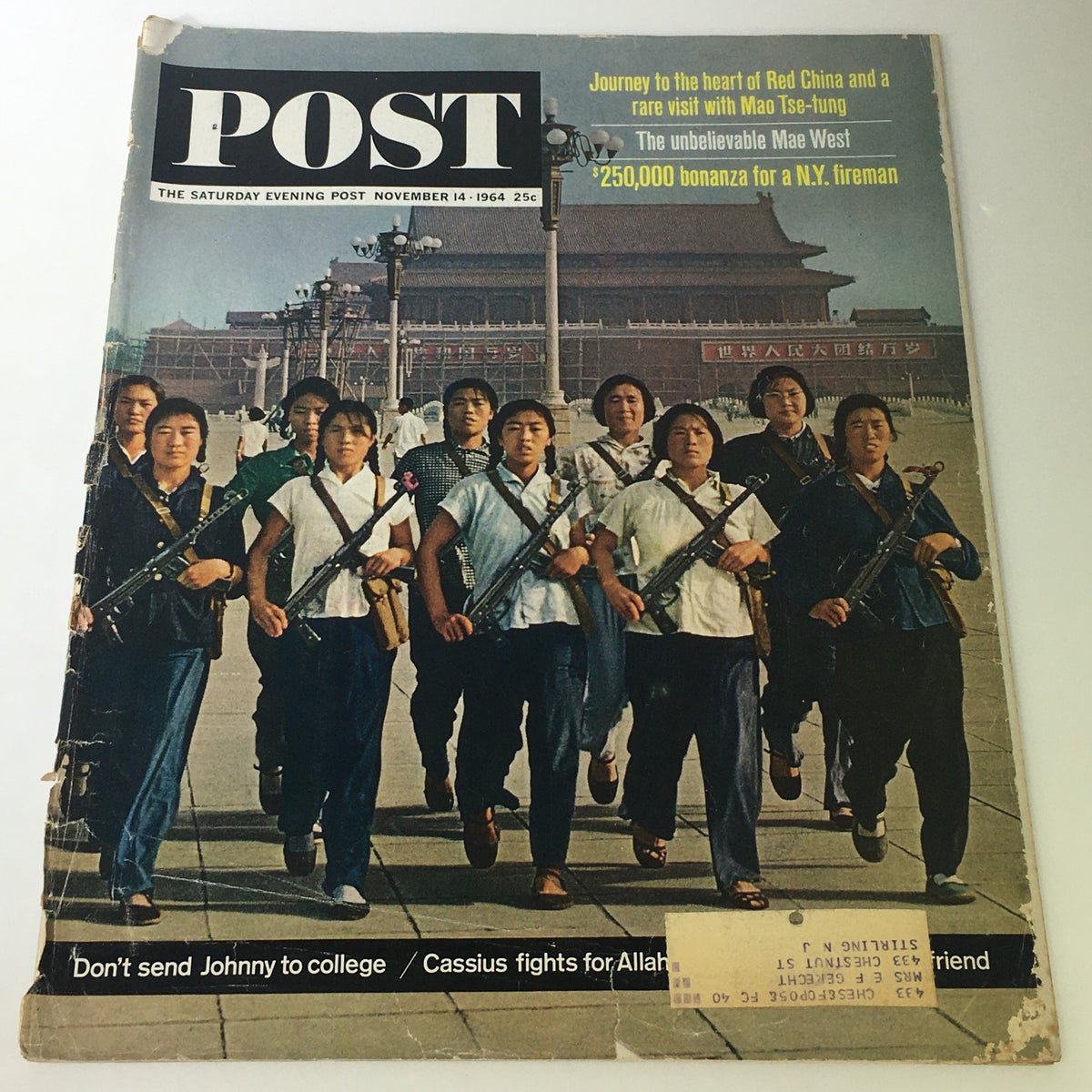 Cover of VTG The Saturday Evening Post November 14 1964 - Girl Scout Chinese Version featuring a group of individuals in traditional attire holding rifles against a historical backdrop.